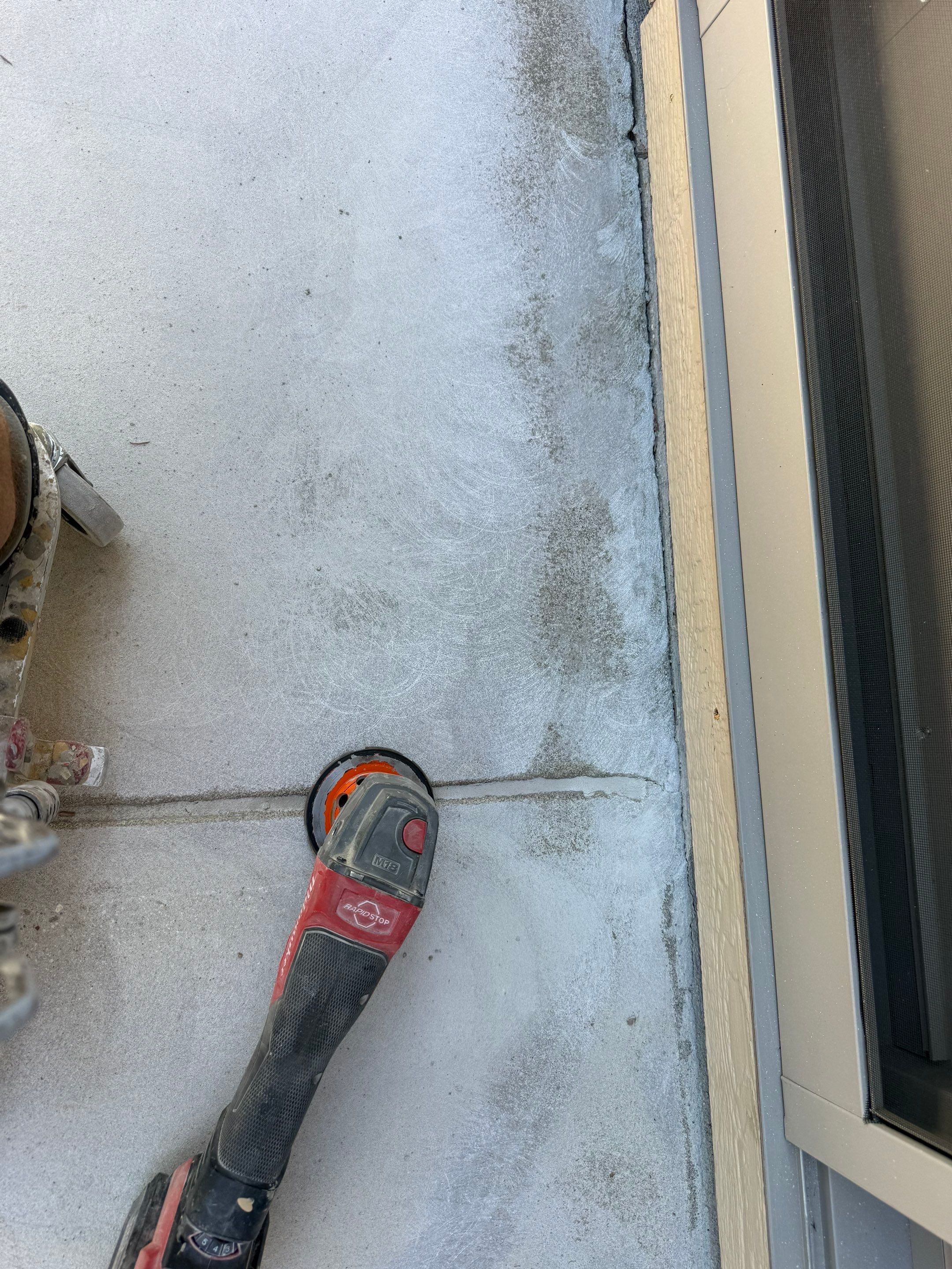 Textured Concrete Coating and Paver Patio Refresh in Sioux Falls by Select Painting, Coatings & Garage Cabinets