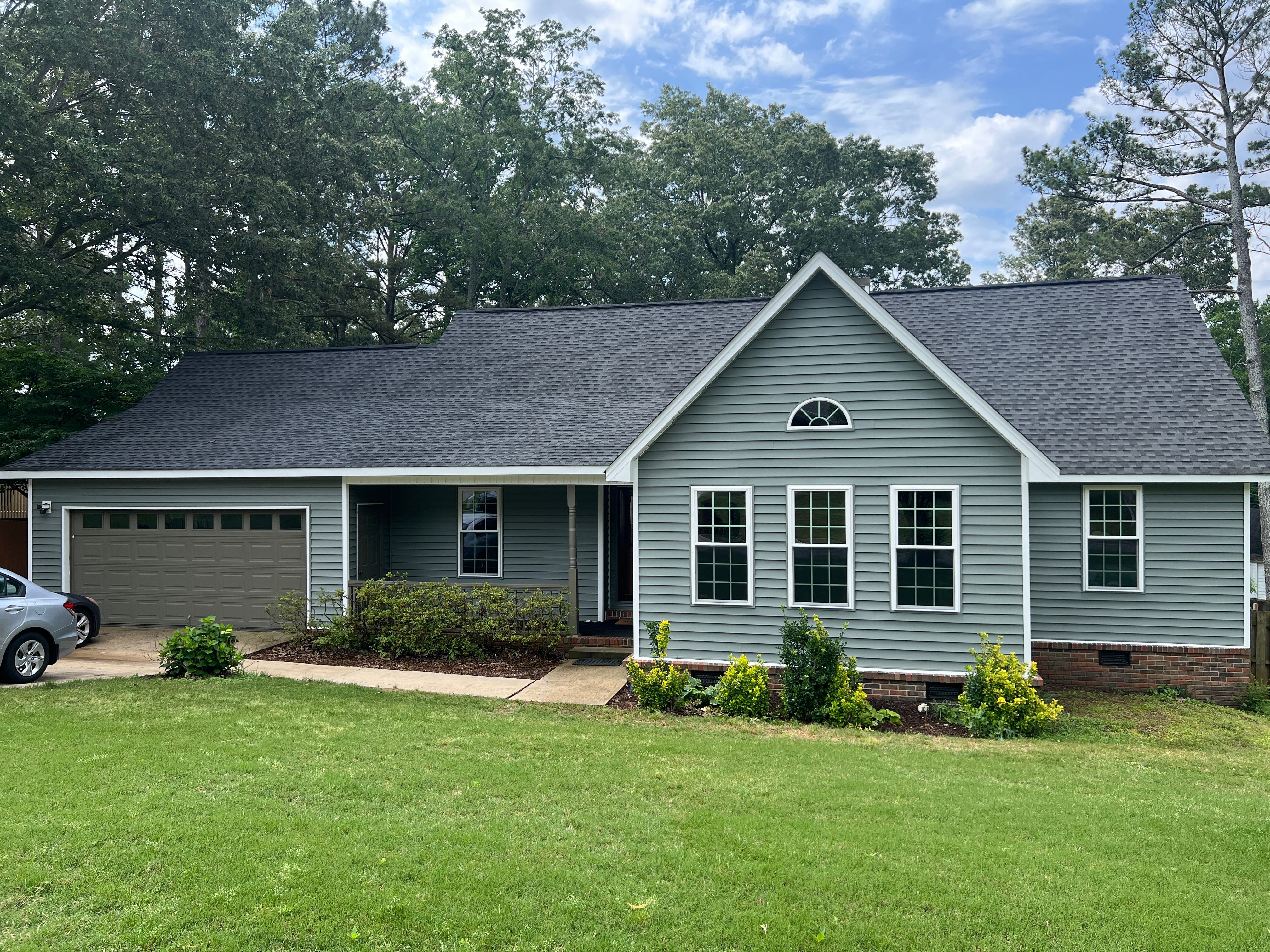 Siding Replacement using Mastic Carvedwood Vinyl Plank by Freedom Exteriors