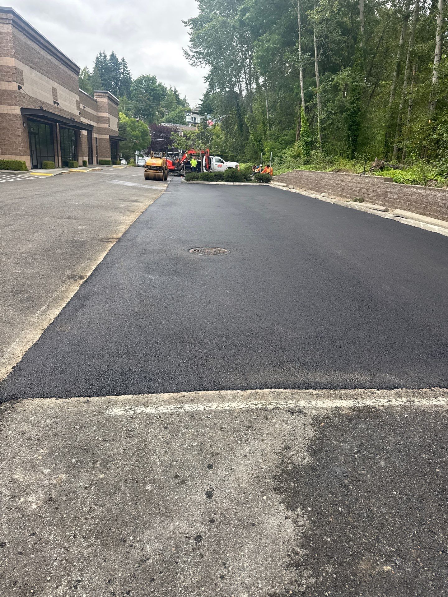 Asphalt Patch Repair & Concrete Curb Renovation | Kirkland  by Jireh Asphalt & Concrete Inc 