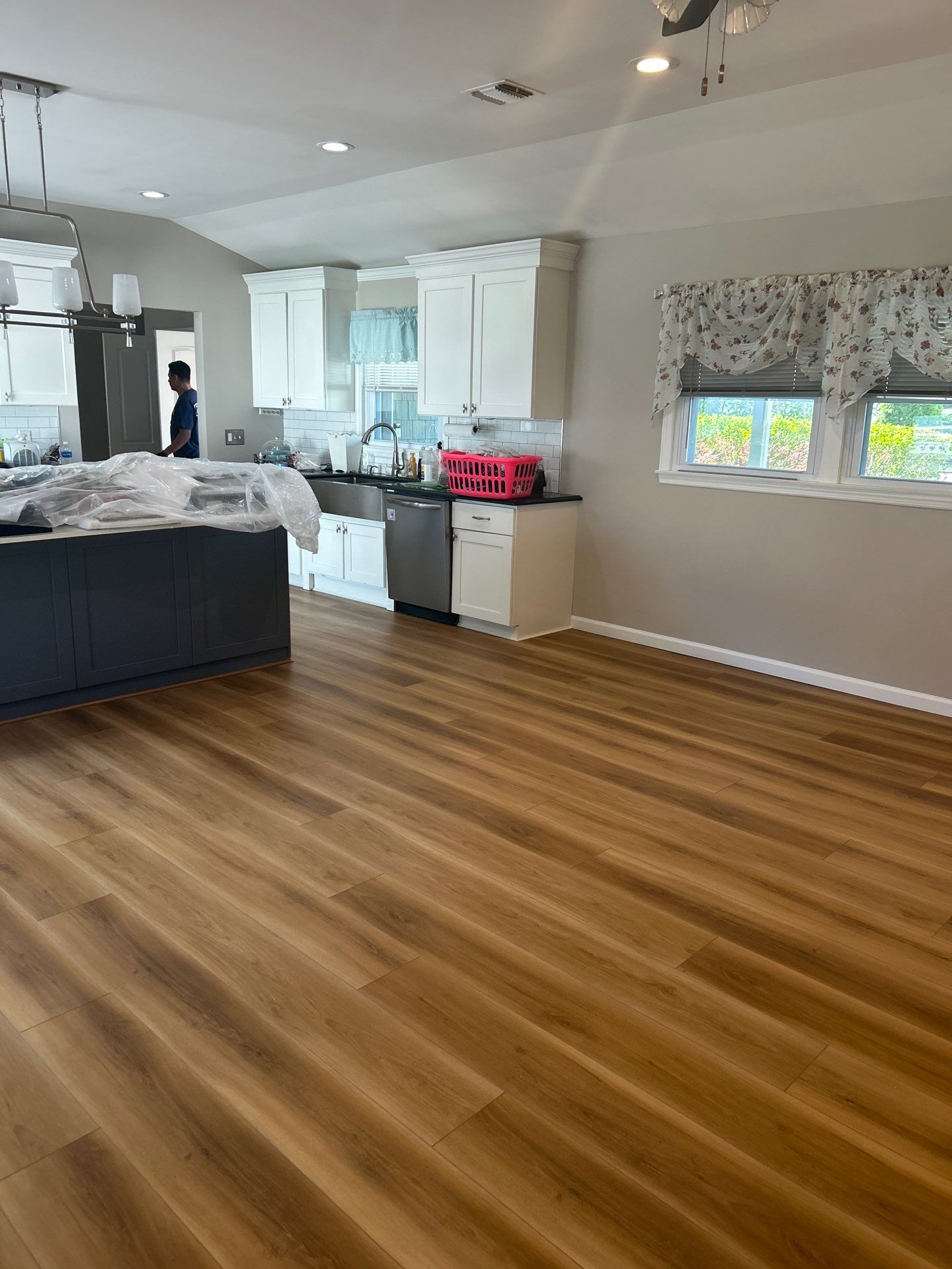 Water Damage Restoration and Full Laminate Floor Installation in Stony Brook