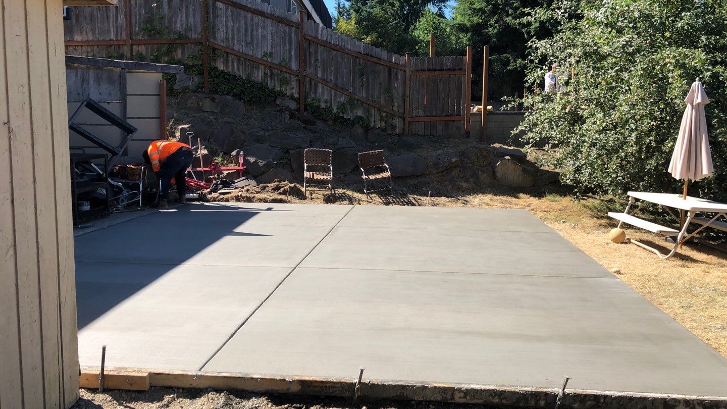 Oscar | Concrete Driveway  by Jireh Asphalt & Concrete Inc 