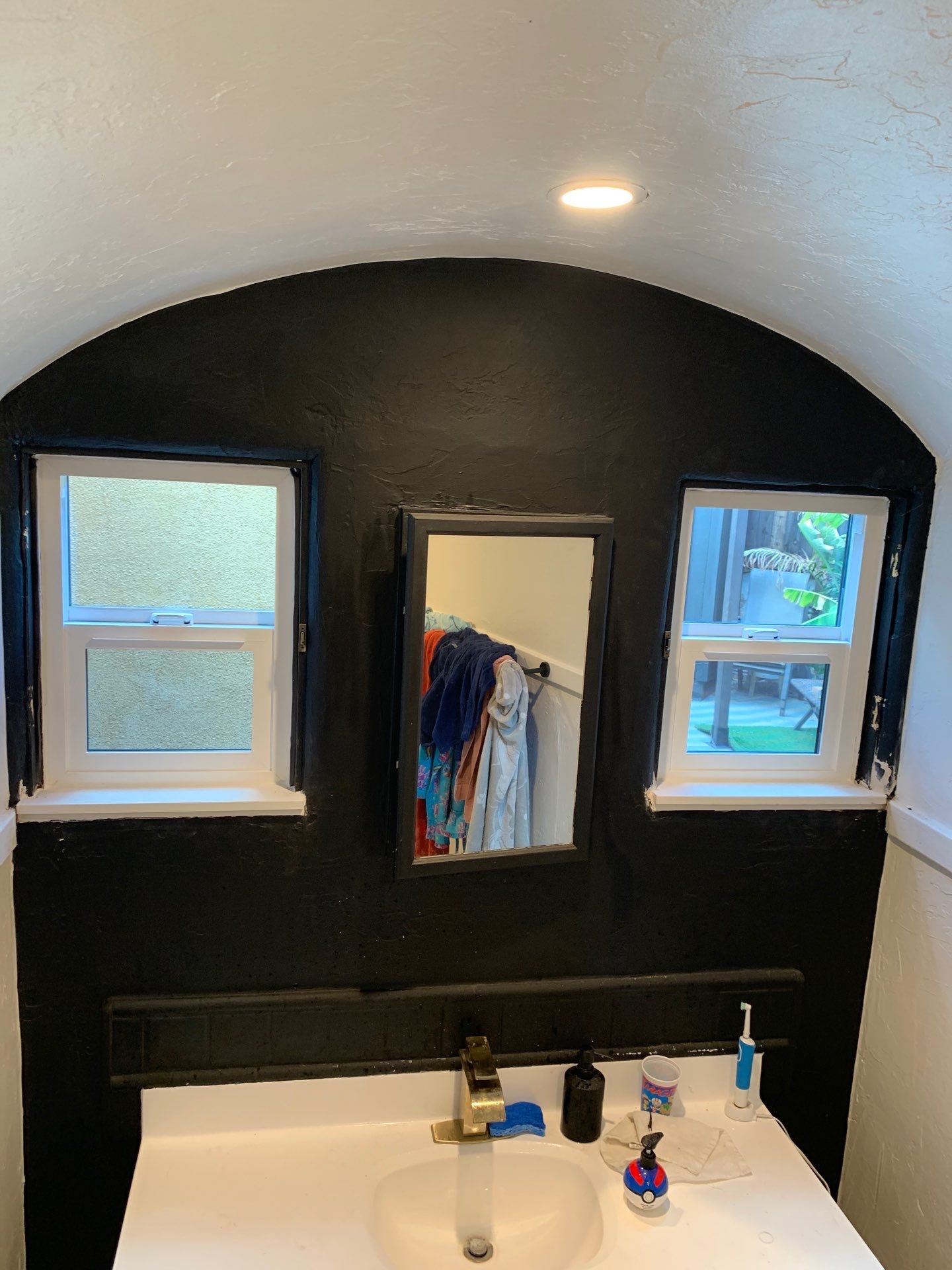 Window Installation using Black Anlin windows by American Window Company