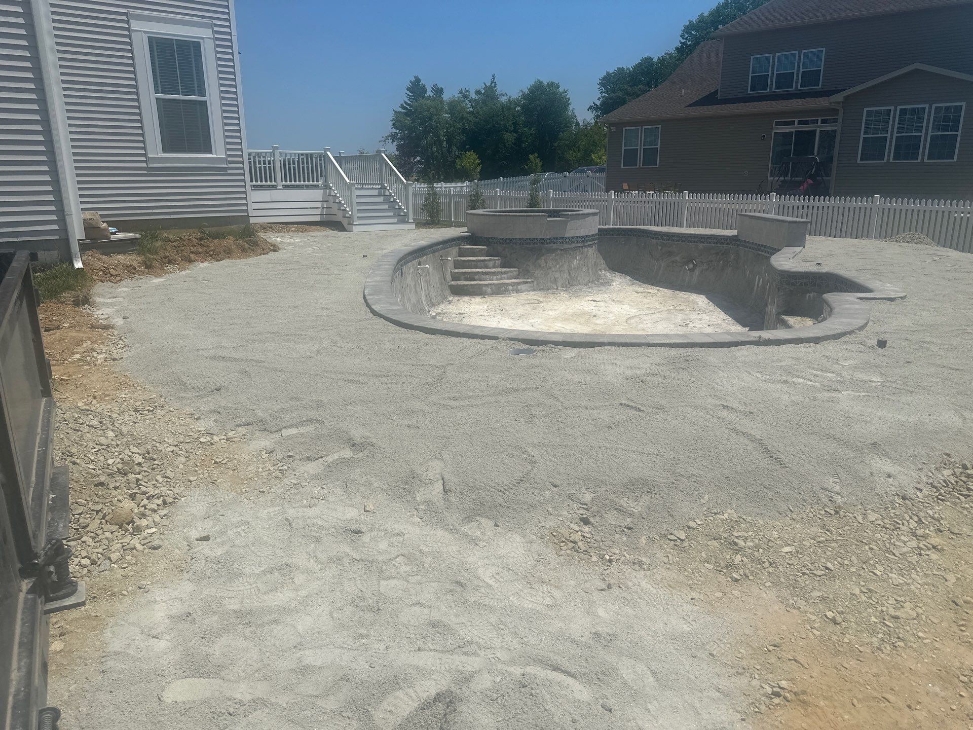 Pool and Hardscape Design in Delaware | Belgard Paver Patio & Outdoor Living Space by Studio G Indoor Spaces & Outdoor Living