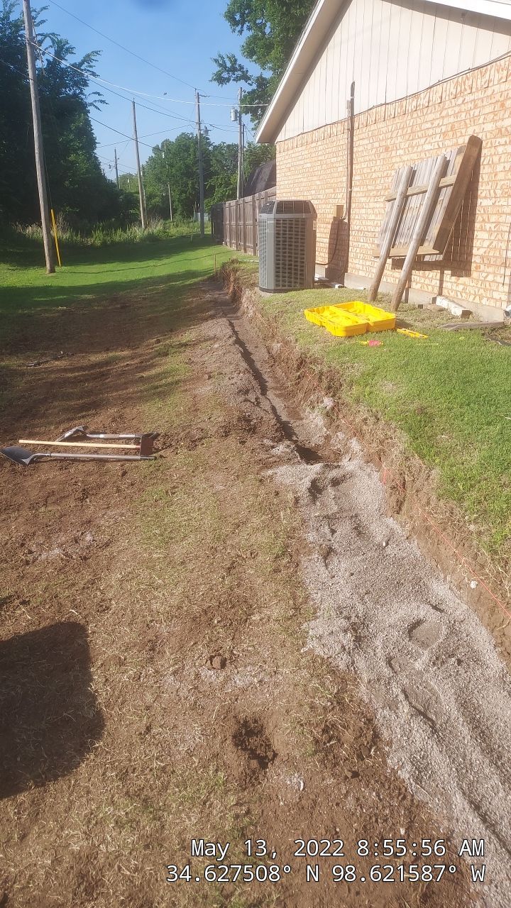 Retaining Wall using Rocks by Clays Services Inc