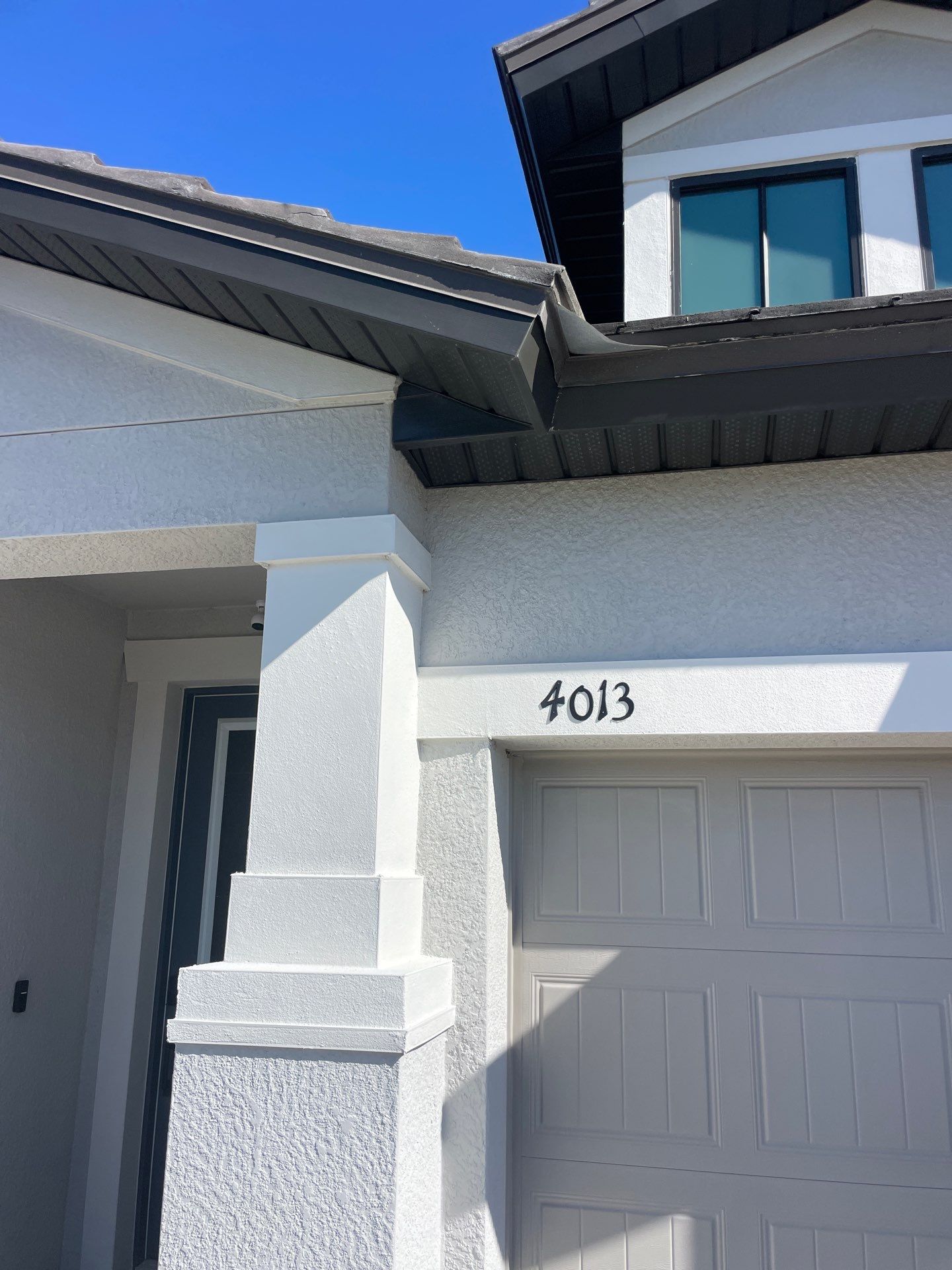 Black Seamless Gutters in Fort Myers FL by Gutter Professors