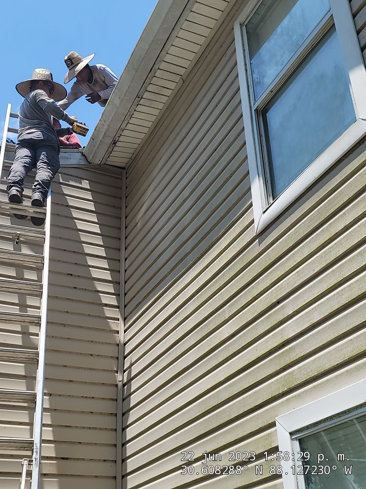 Residential Roofing Installation using Roof Replacement by American Roofing & Construction LLC