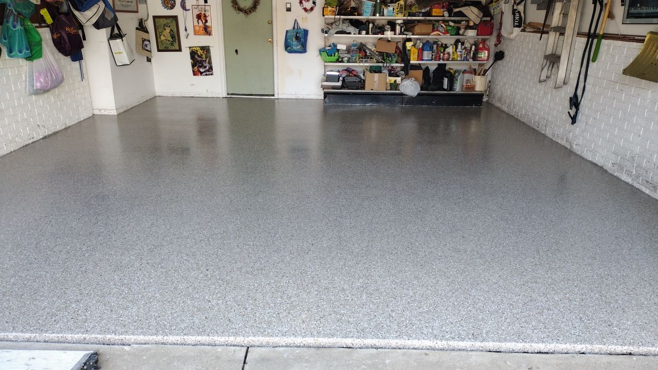 Garage Floor Coating using Pebble Bech Flakes by Revival Concrete Coatings