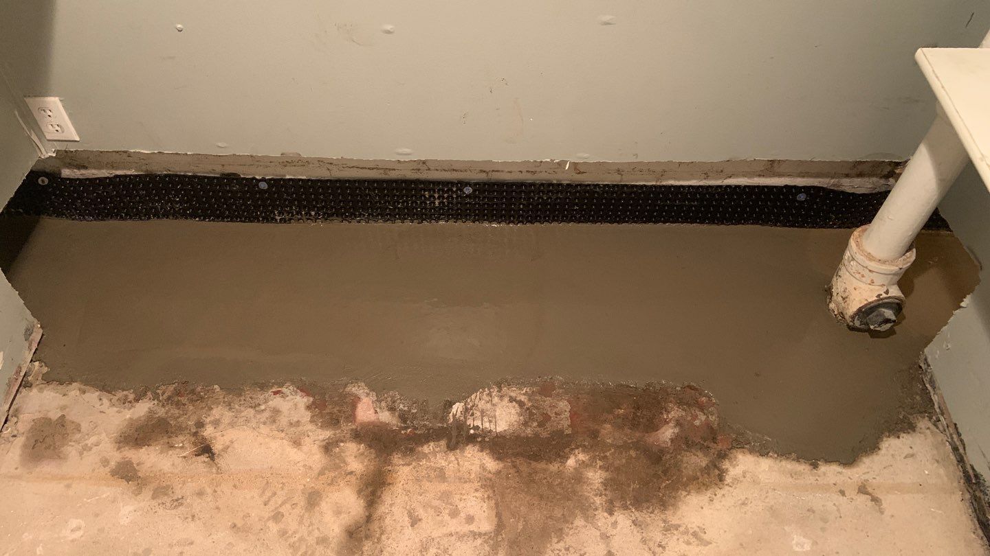Solving a One-Wall Water Issue in St. Paul by Waterproofing Northeast