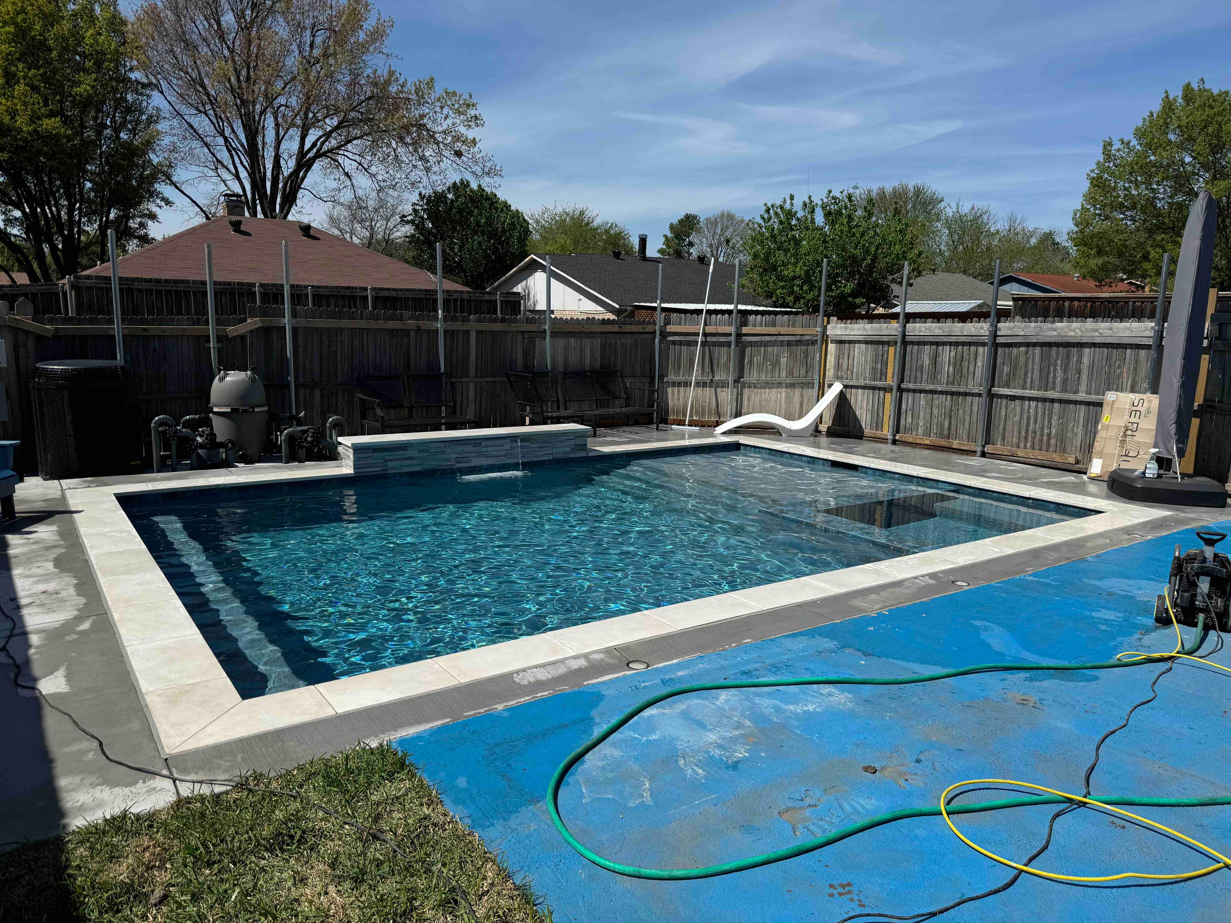 Geometric Pool with Raised Spa and Tanning Ledge by Pinnacle Pools and Spas - DFW