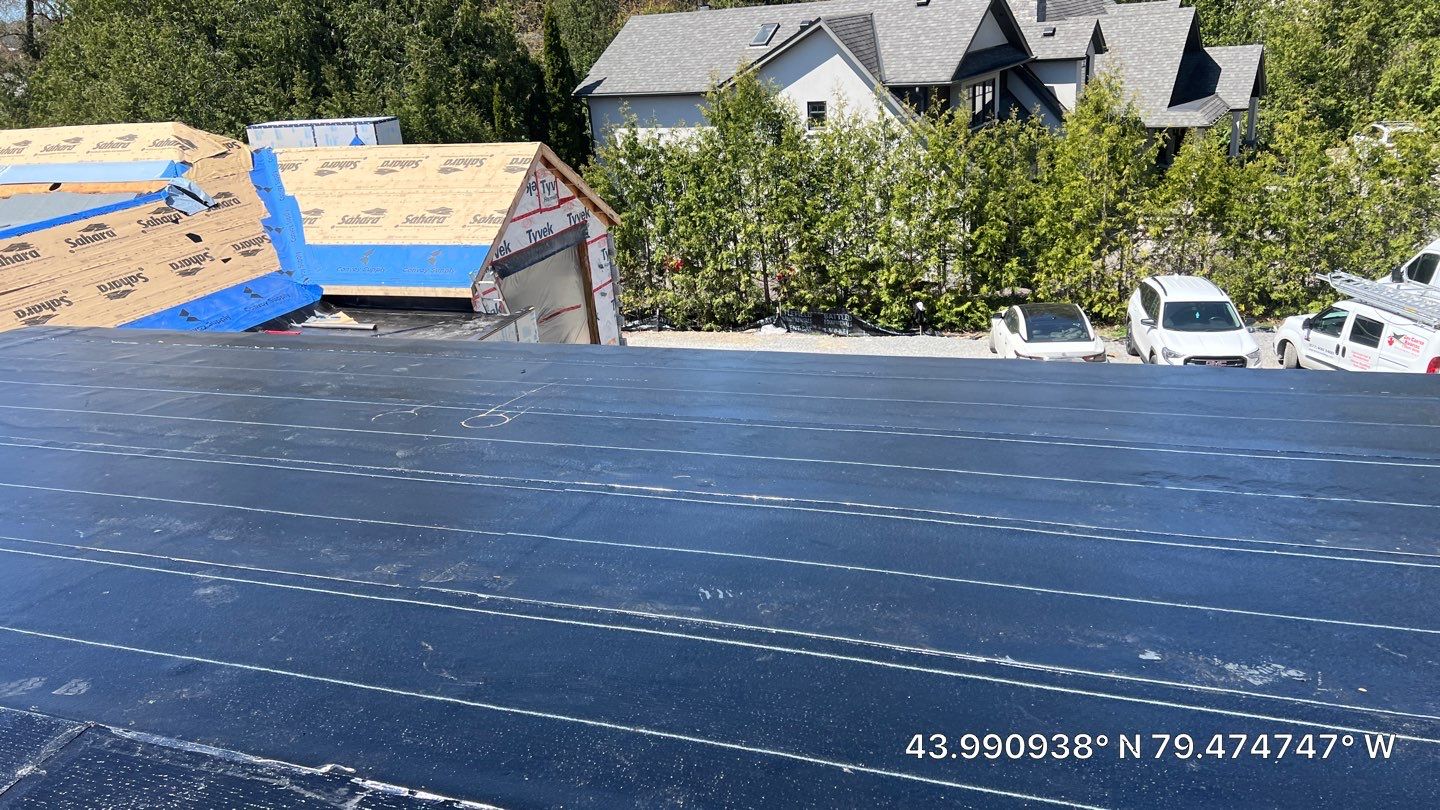 Custom Home Jet Black 24 GA Standing Seam Roof  by Jay Carter Roofing & Sheet Metal