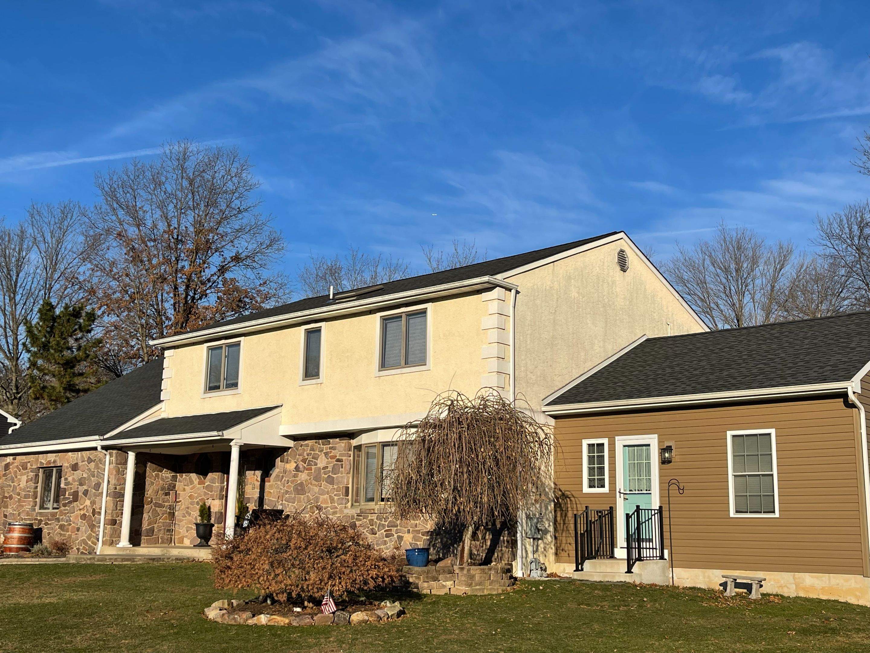 Roofing and Gutters  by Stofan Construction LLC
