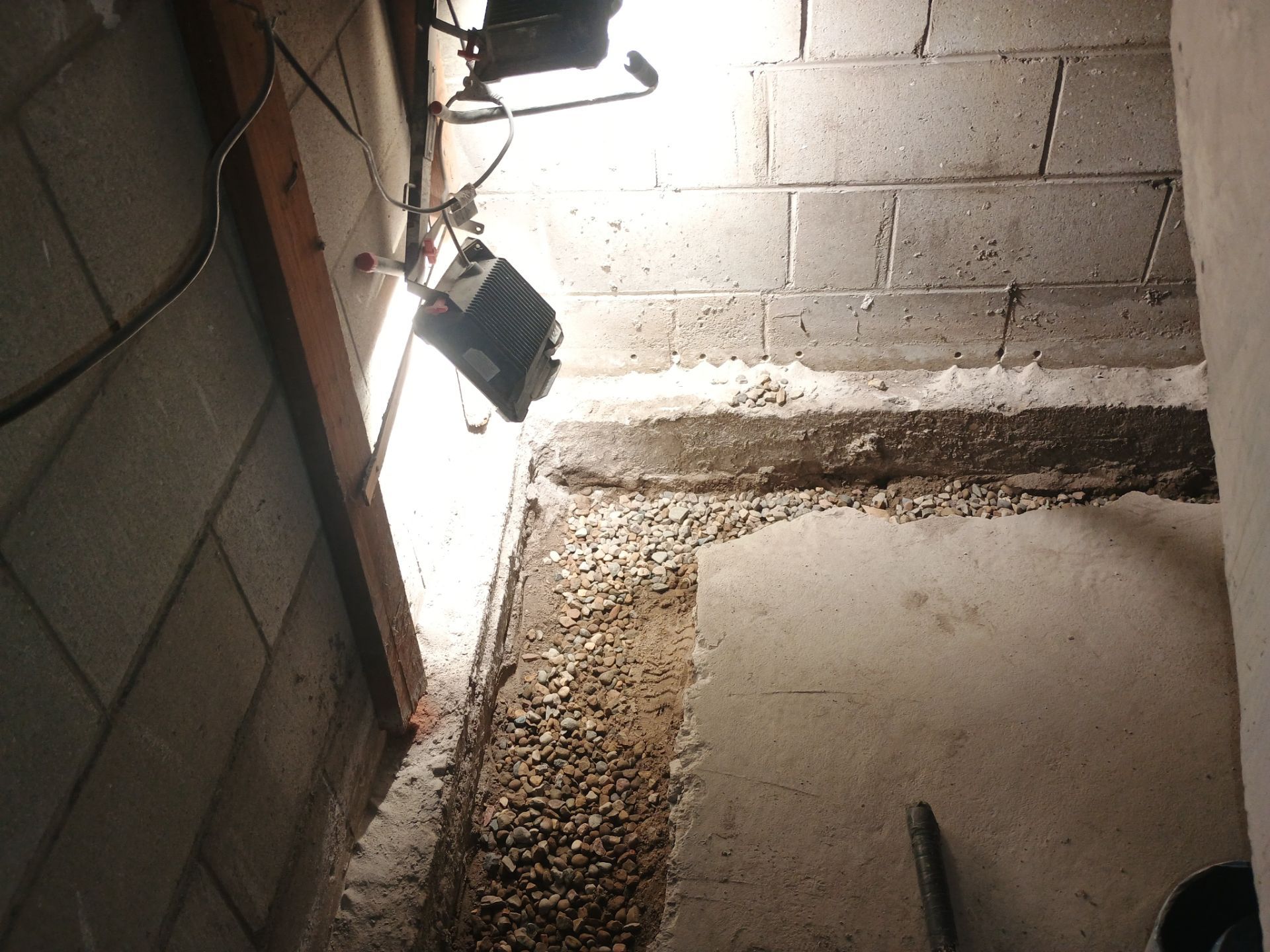 Interior Drain Tile & Buried Discharge in South Minneapolis by Waterproofing Northeast