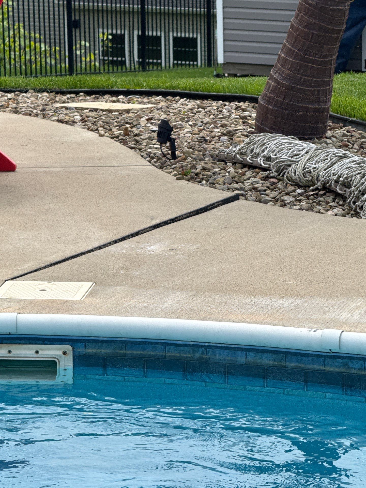 Twilight Pool Deck / Patio Project in Beaver falls by Floors in a Day, Inc