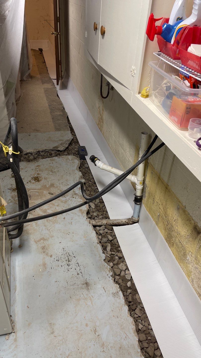 Interior Waterproofing Using GrateDrain™ Products by Toledo Basement Repair 
