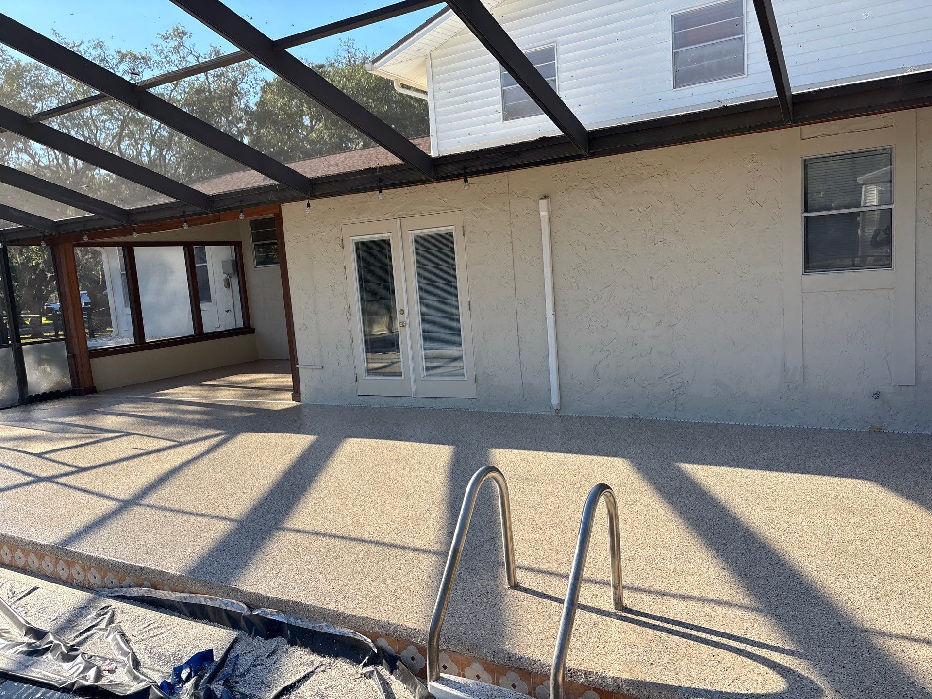 New Port Richey Pool Deck Transformation by Performance Floors & Coating