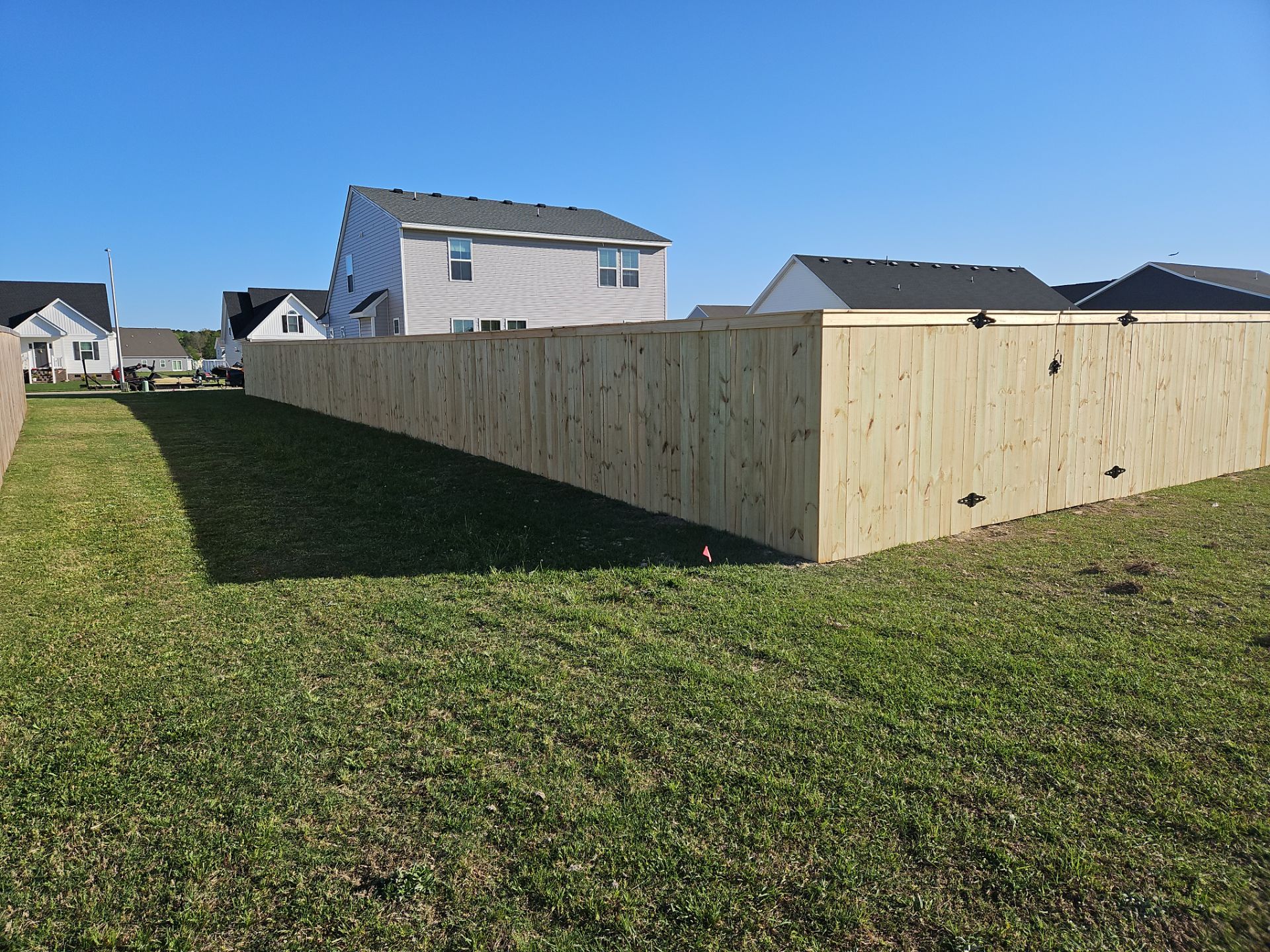 Stronger. Sleeker. Wood. by Tidewater Fence