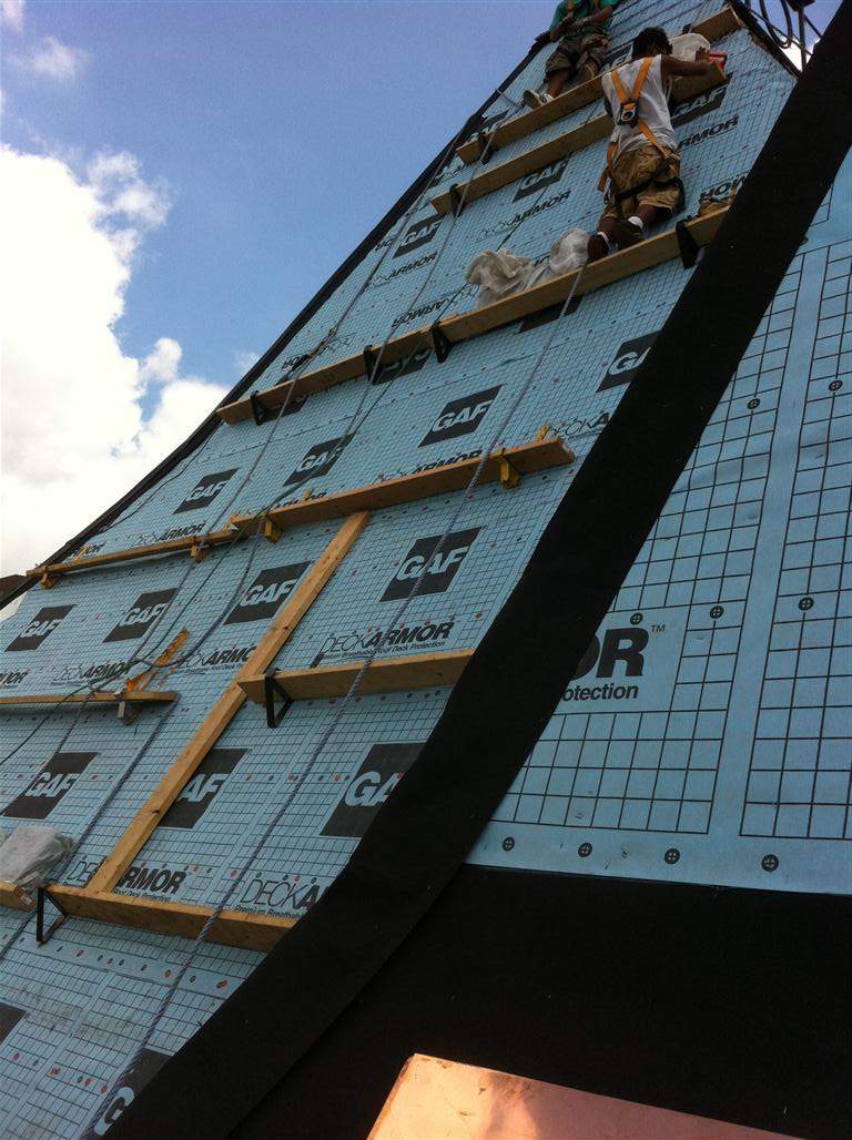 Historic Building ROOF REPLACEMNT with GAF TruSlate  on steep slop and Versico 60mil TPO on flat roof by Gorilla Exteriors Contracting, LLC