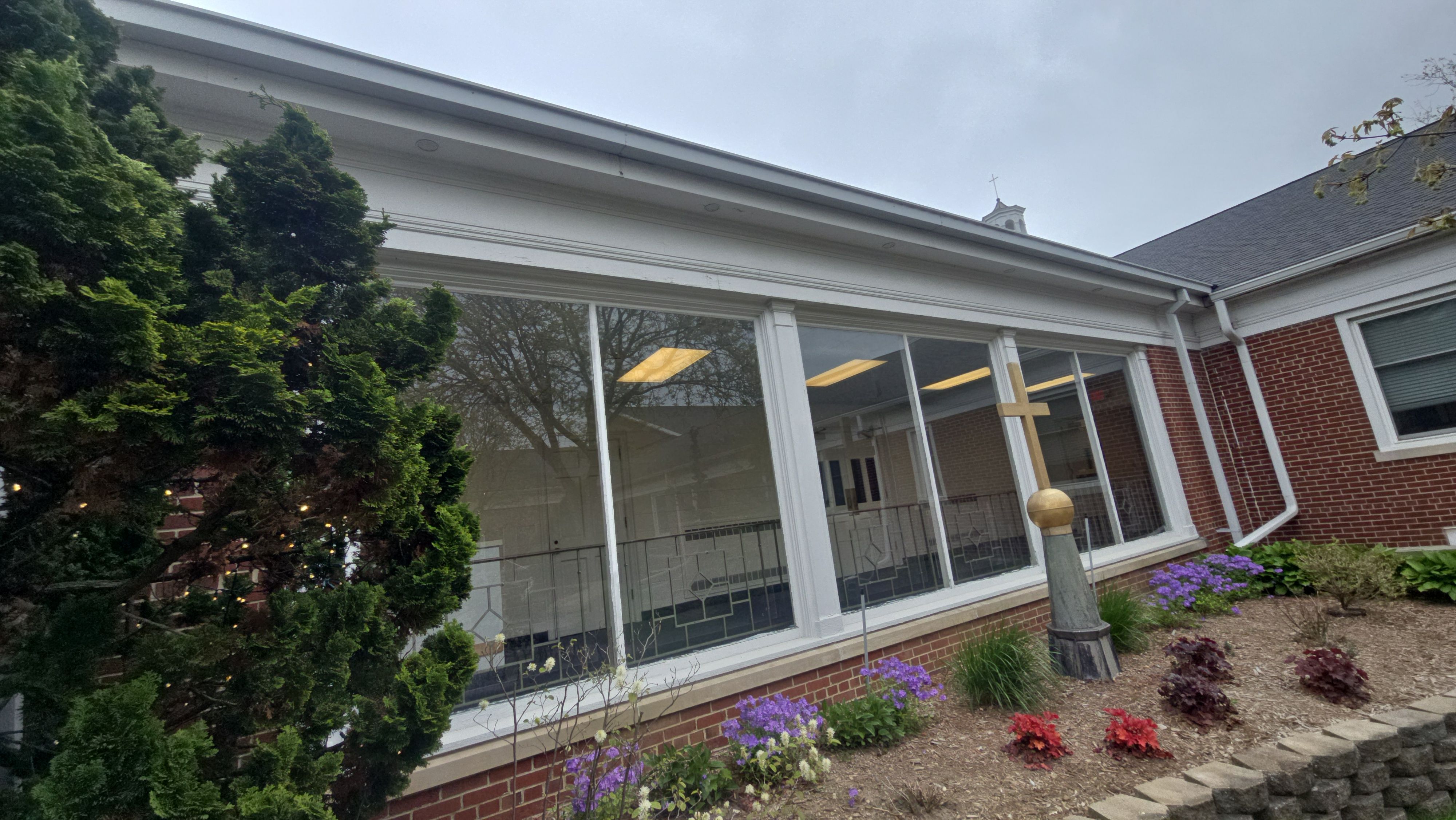 Commercial Wood Trim Restoration and Gutter Replacement in Birmingham by Top Shelf Painter