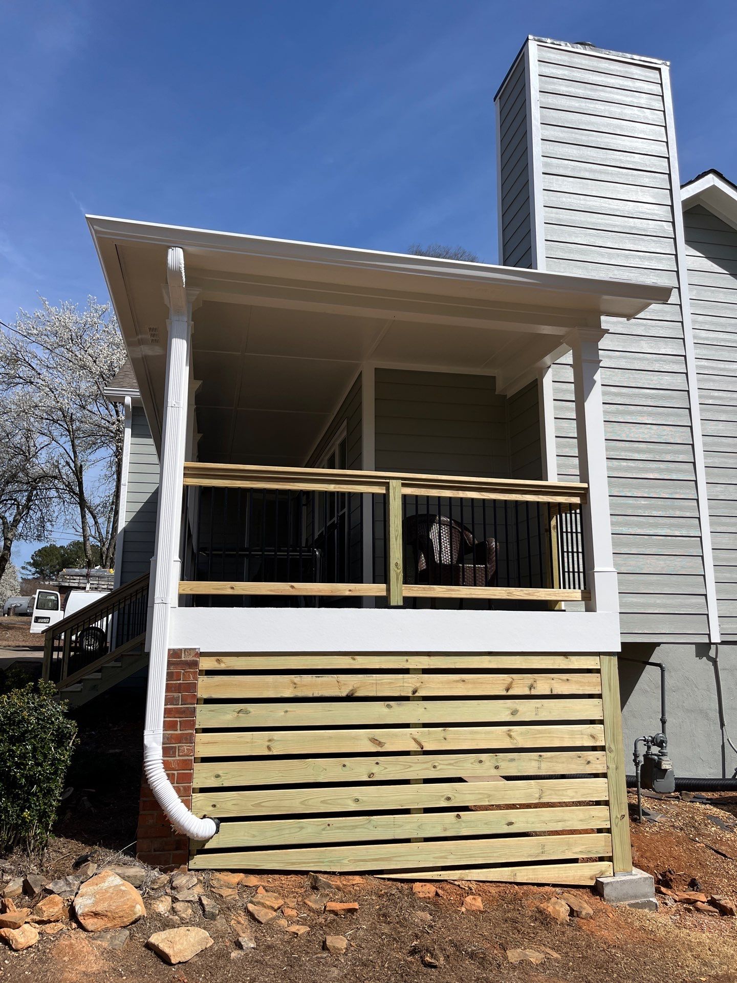 Acworth, GA James Hardie Board and Batten Siding Installation, Porch Renovation, Exterior Painting, and Window Replacement by Nelson Exteriors 