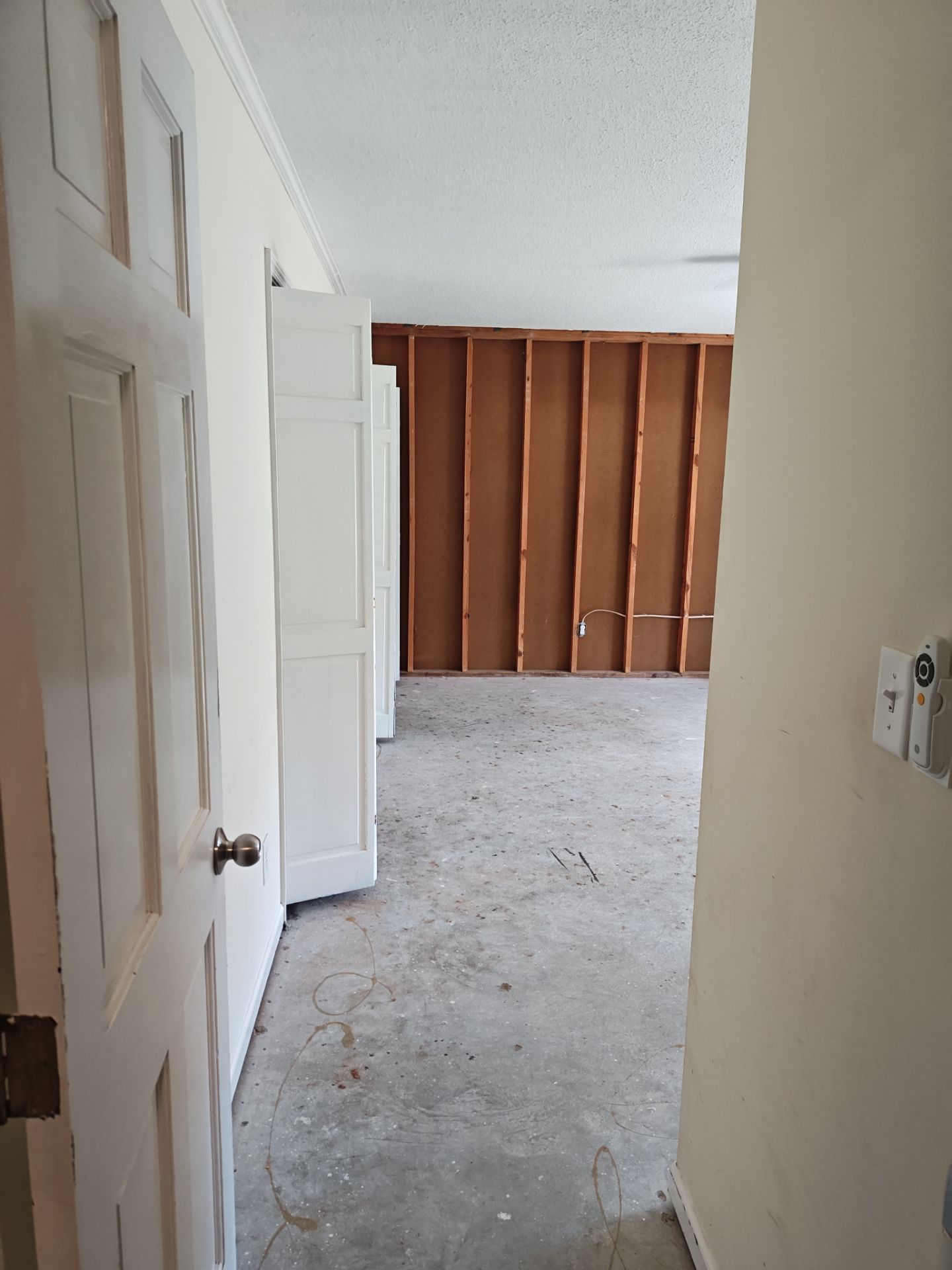 Interior Renovation Featuring Stone Fireplace and Subfloor Restoration in Valdosta by Trinity General Contracting Pros