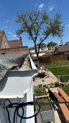 Turtle Shell gutter protection installation in Chicago, IL 60634, photograph 12