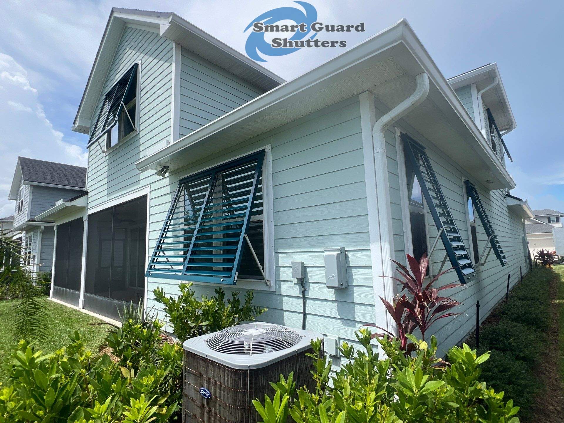 Impact Bahama Shutters in Ocean Blue by Smart Guard Shutters
