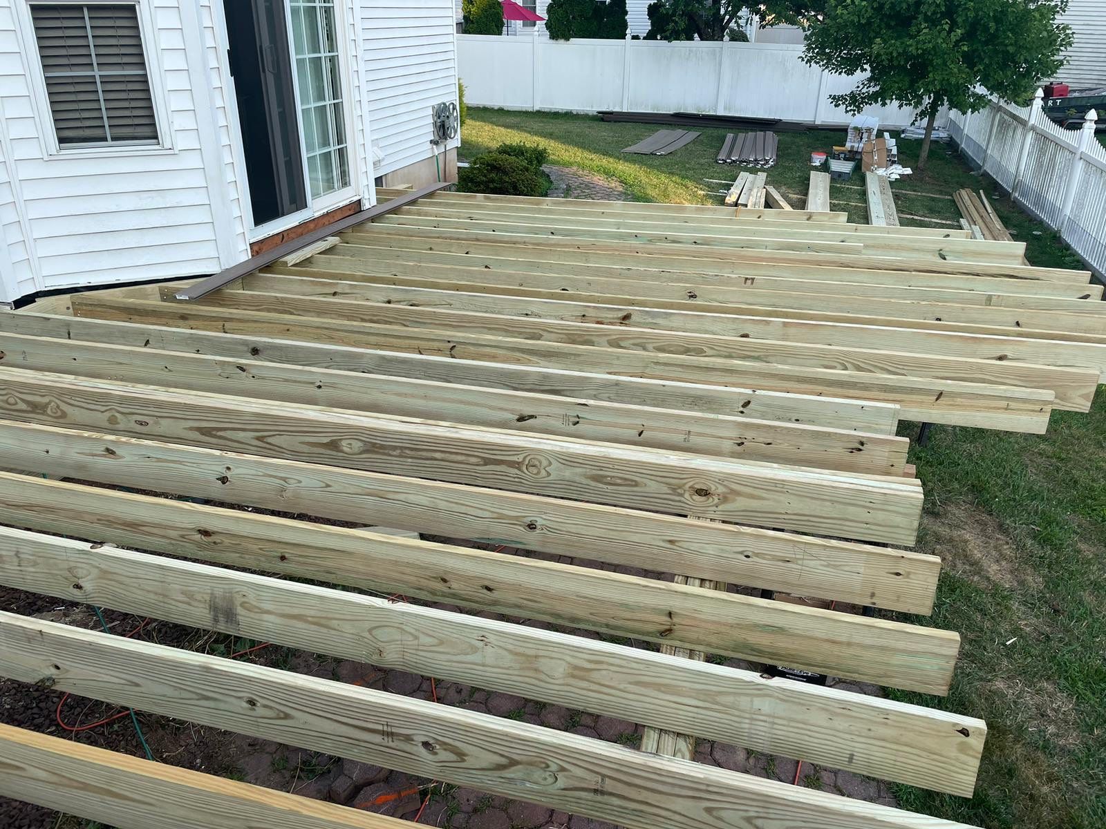 New Deck with Pergola and Vinyl Lattice by deck guardian