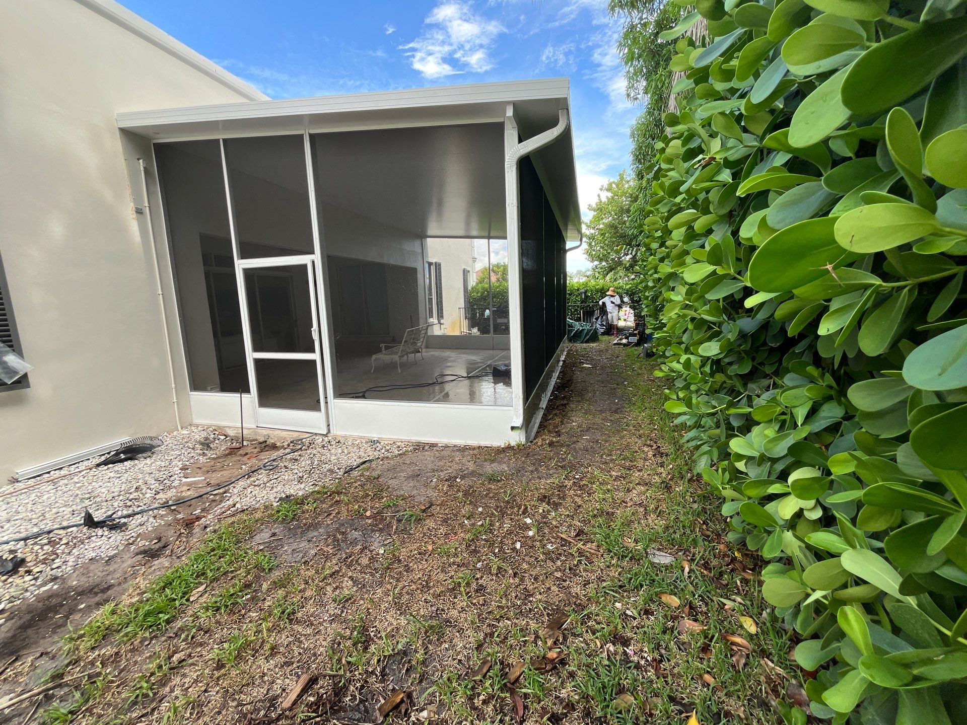 Aluminum Insulated Roof and Screen Enclosure Installation in Atlantis by The Screen Depot, Inc