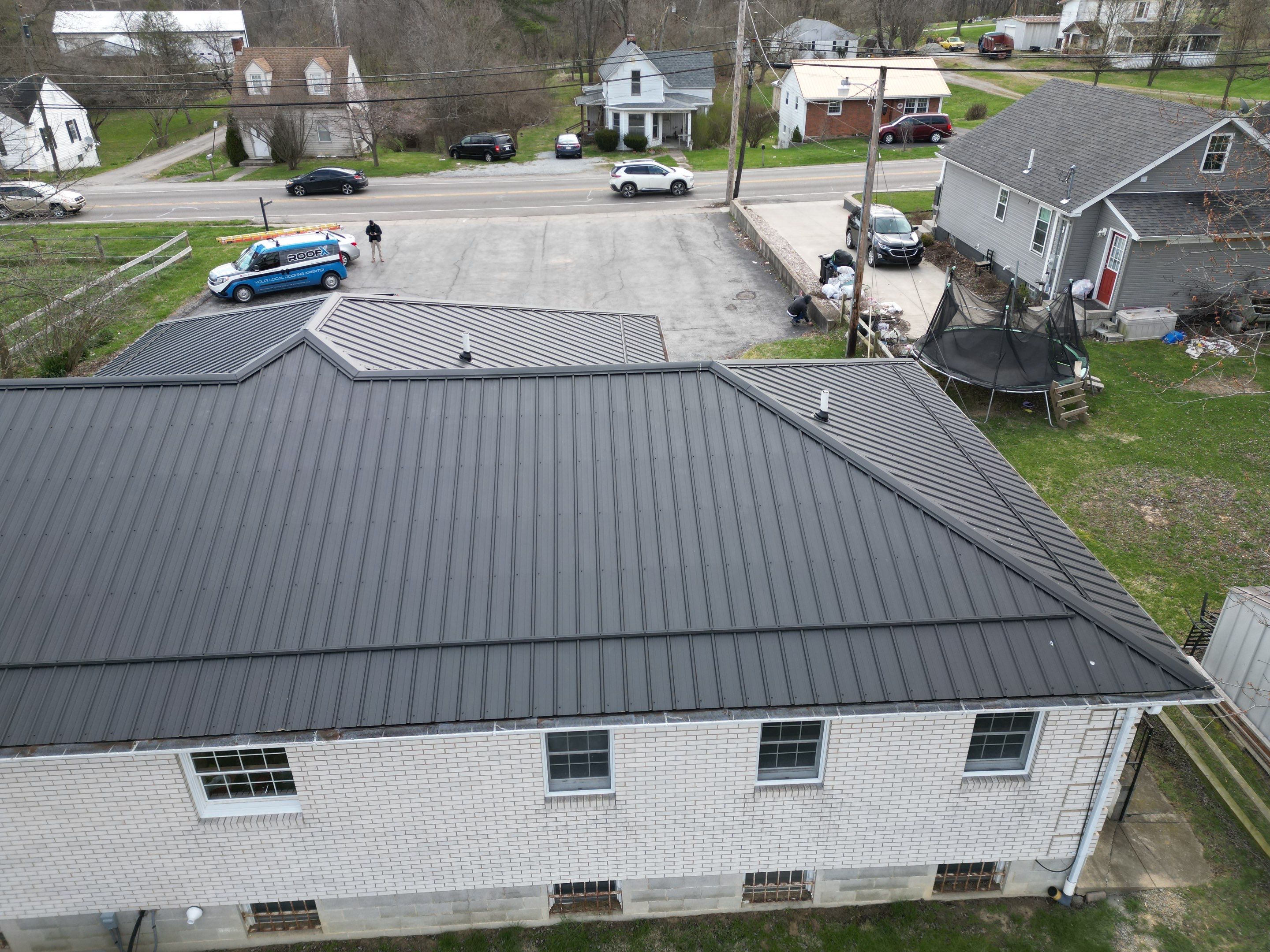 Commercial Roofing Installation using Performance Panel Metal - Frost Black by RoofX 