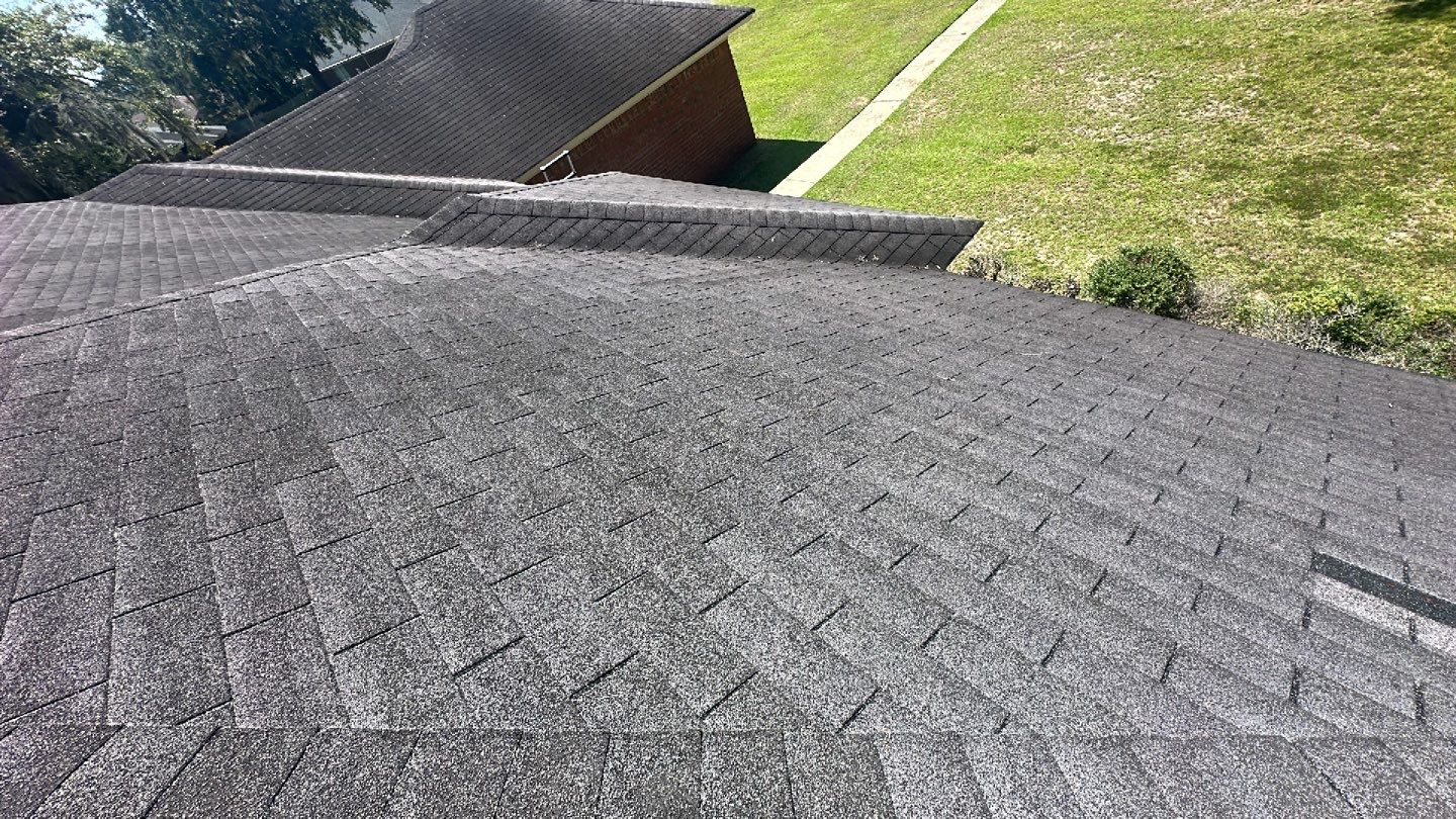 Residential Roofing Installation using Benton 26Ga 1inc Snapcock Metal Roof KYNAR Matte Black by Talya Roofing