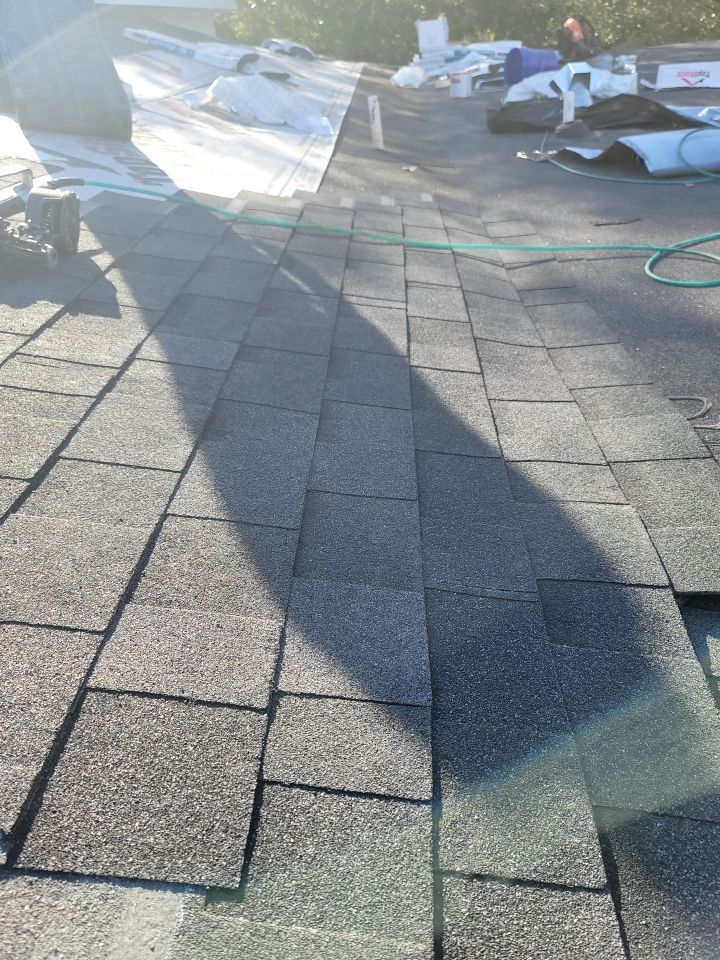 Residential Roofing Installation using Roof Replacement by American Roofing & Construction LLC
