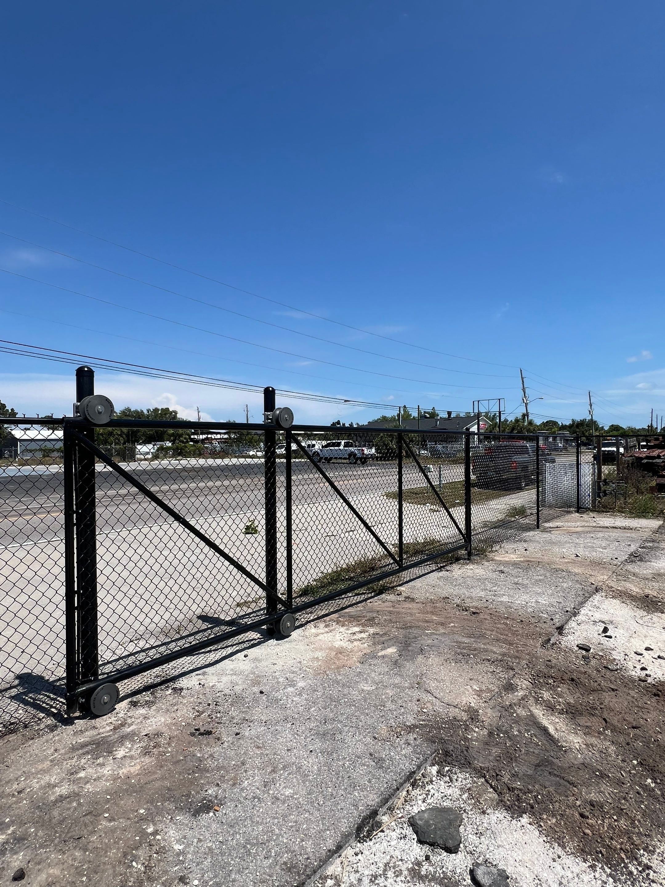 Chain-link Fence Installation using 6ft Black Chain Link Fence  by Asap fence and gates, LLC