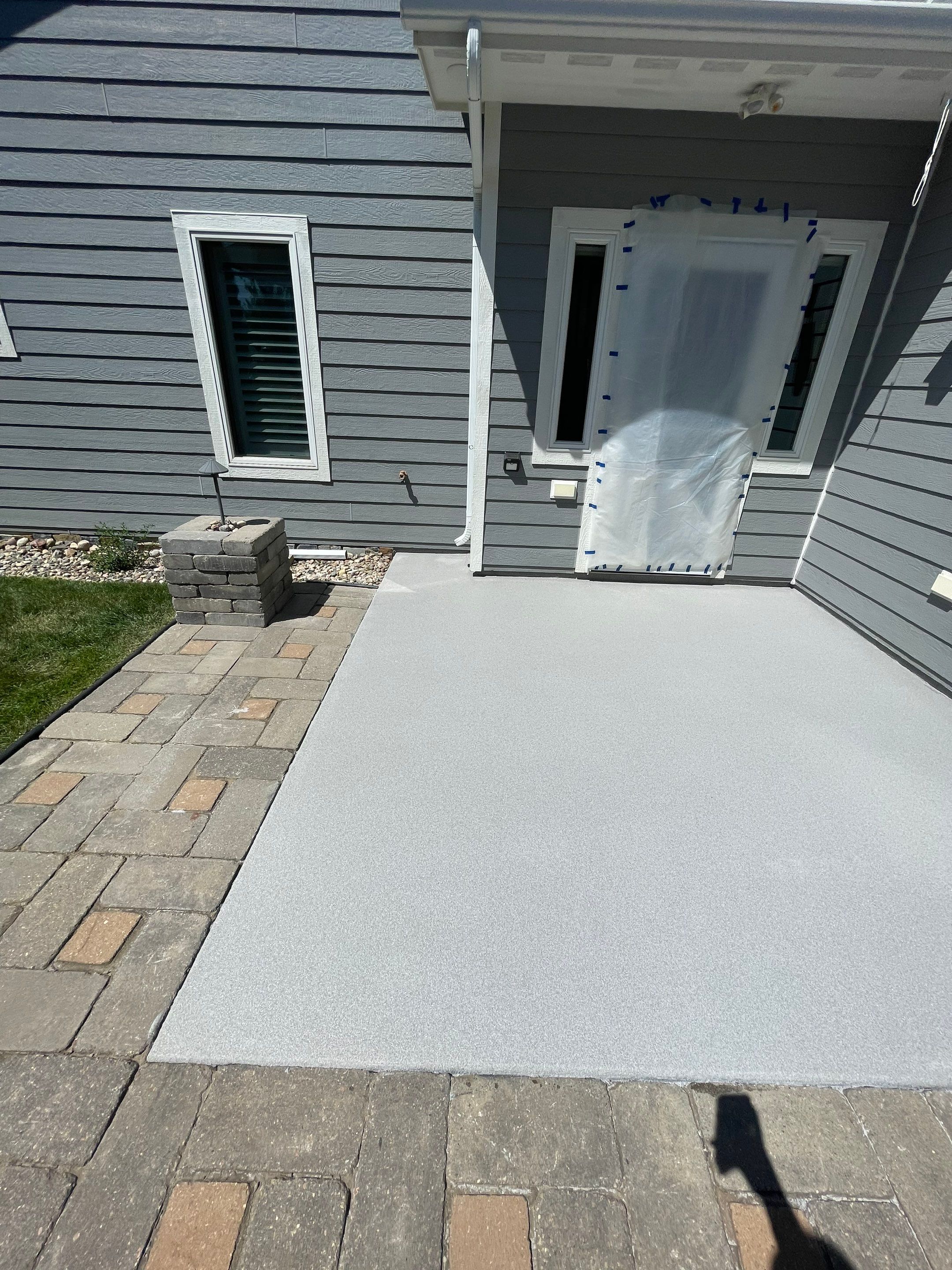 Concrete Patio Coating with Fuzzy Wool Finish in Sioux Falls by Select Painting, Coatings & Garage Cabinets