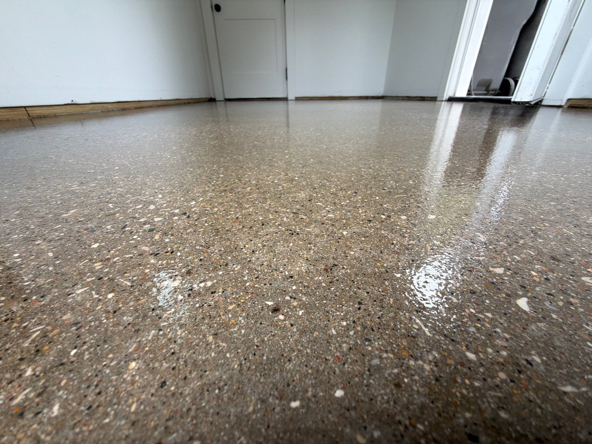 Speckled Epoxy Floor Installation and Concrete Refinishing in Nunica by Gordon Painting