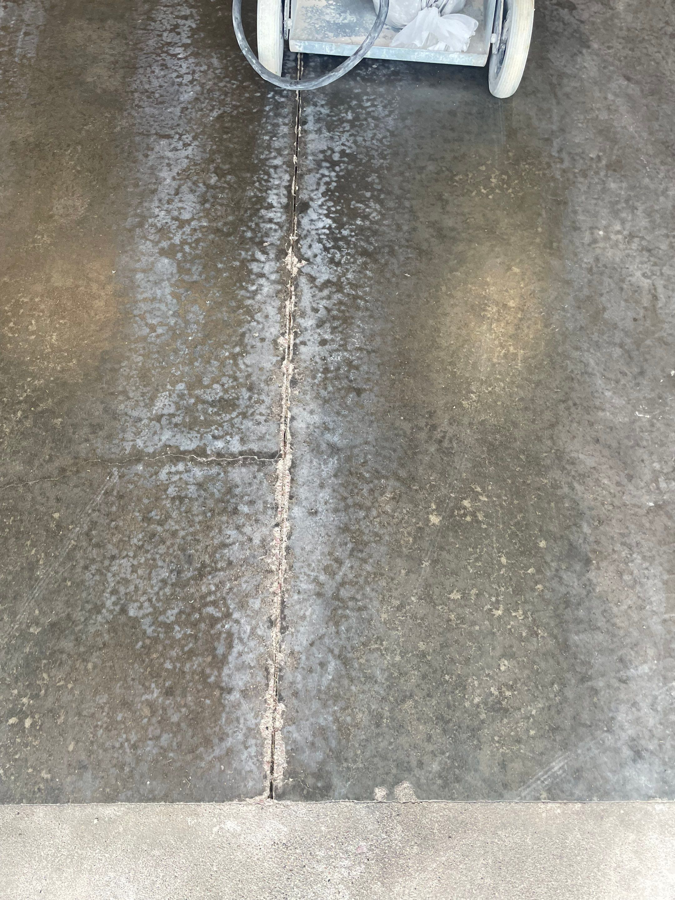 Multi-Stall Garage Floor Coating Installation in Sioux Falls by Select Painting, Coatings & Garage Cabinets