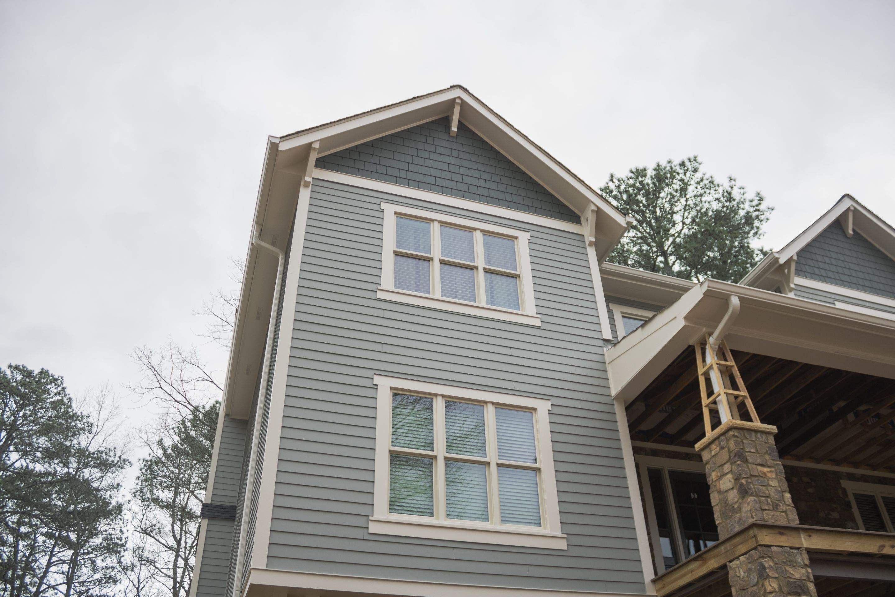 James Hardie Siding Replacement, Exterior Painting, Deck Stain, and Gutter Installation in Peachtree Corners, GA by Nelson Exteriors