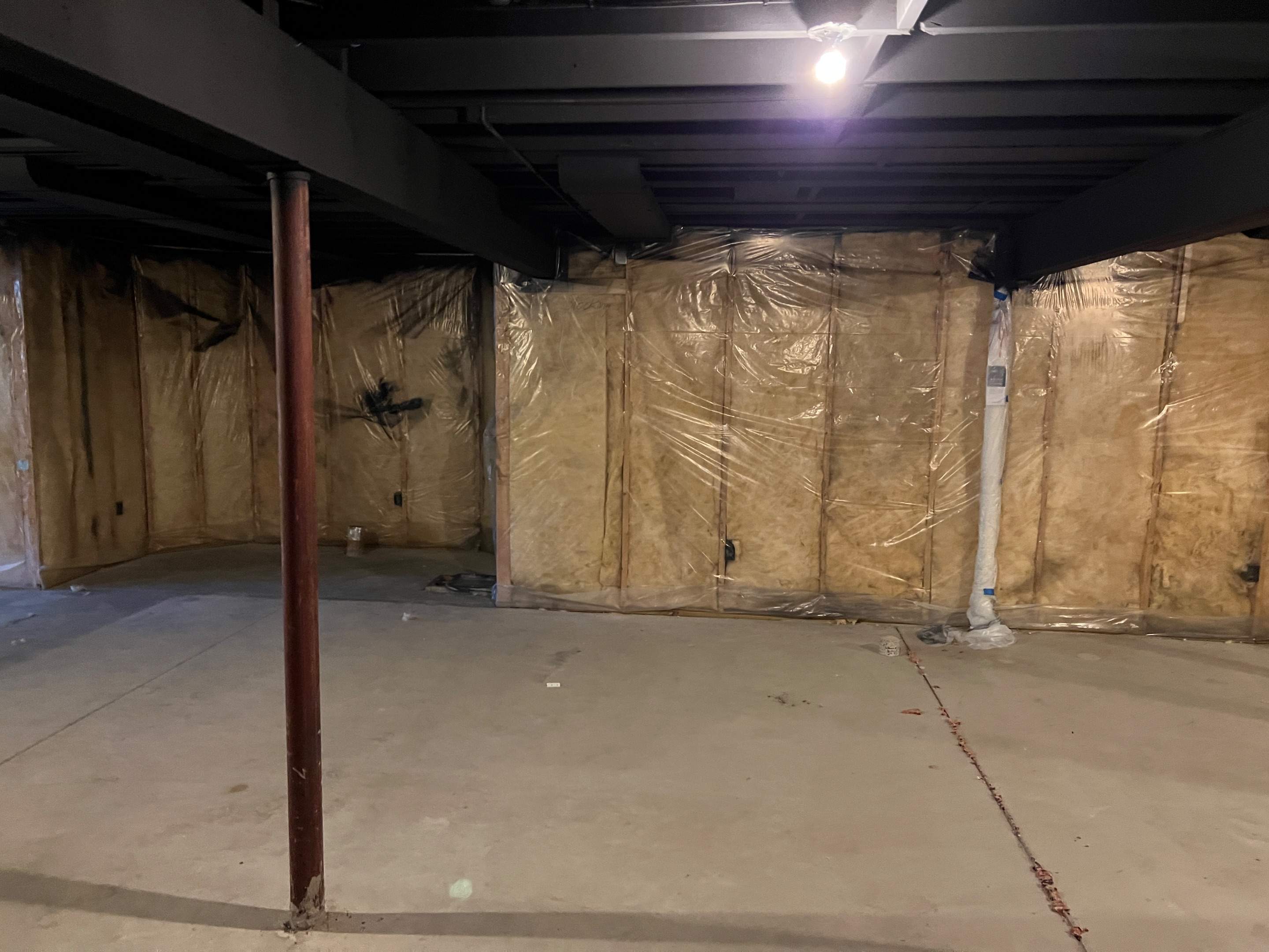 Basement Remodel w/ LVP Flooring & Exposed Ceiling by Chagnon Building & Remodeling LLC