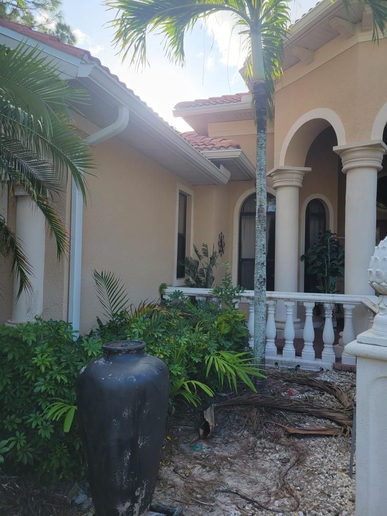 New Splash Guards and 6-Inch seamless Gutters in Naples FL by Gutter Professors