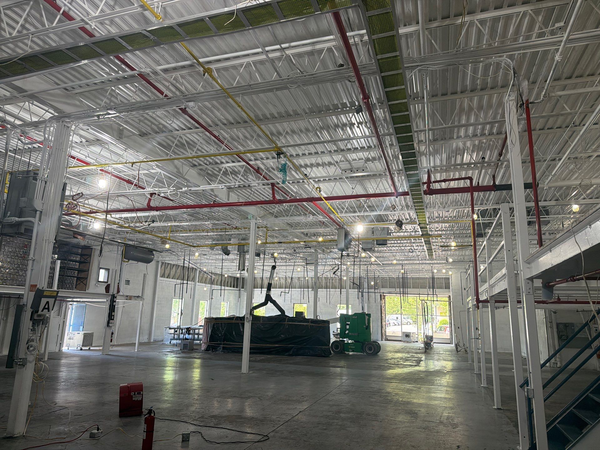 Industrial Warehouse Fire Damage Cleaning and Spray Sealing in Islandia by EMS Restoration Corp