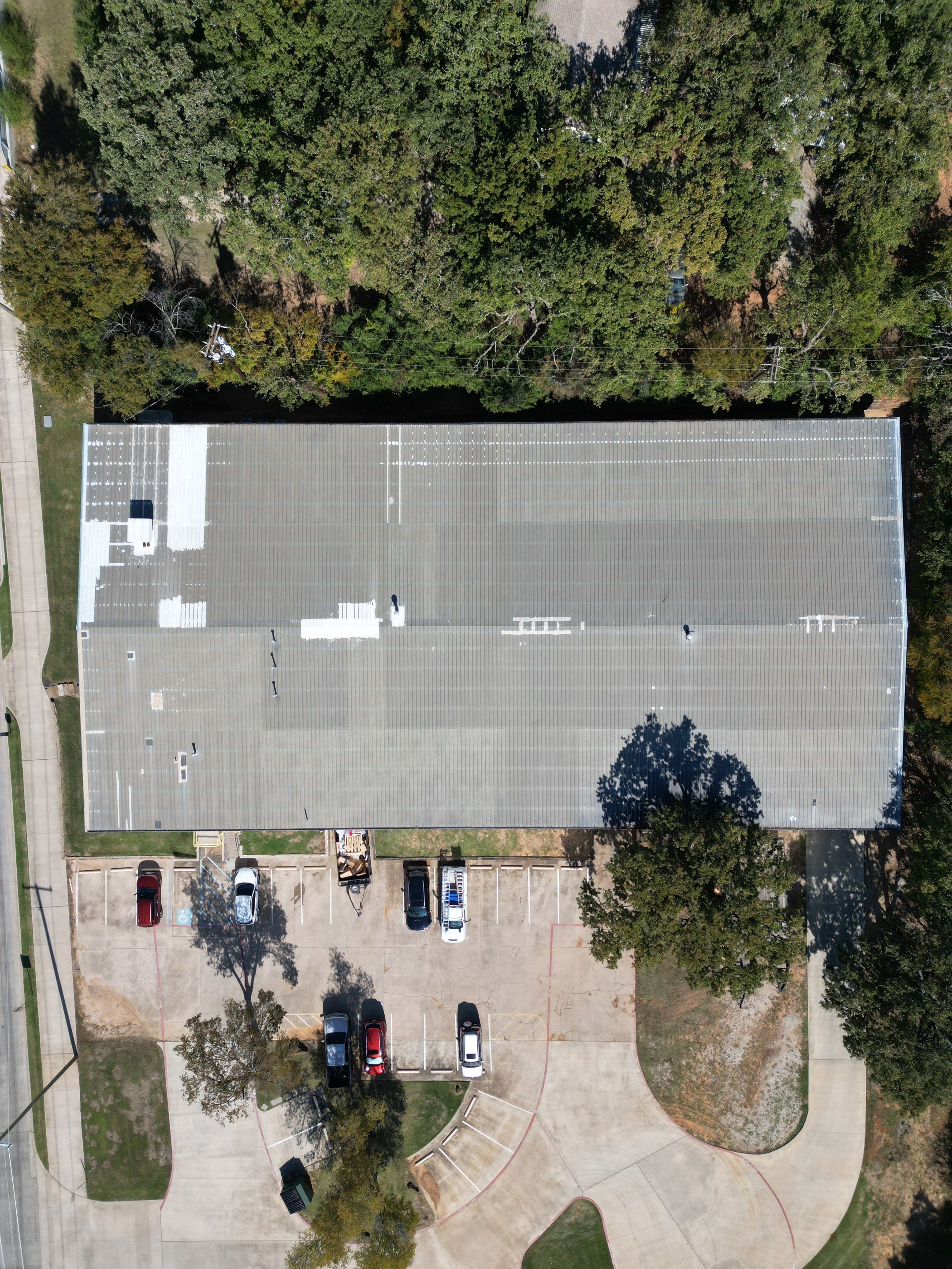 Silicone Coating Metal Rehab by First Out Roofing 