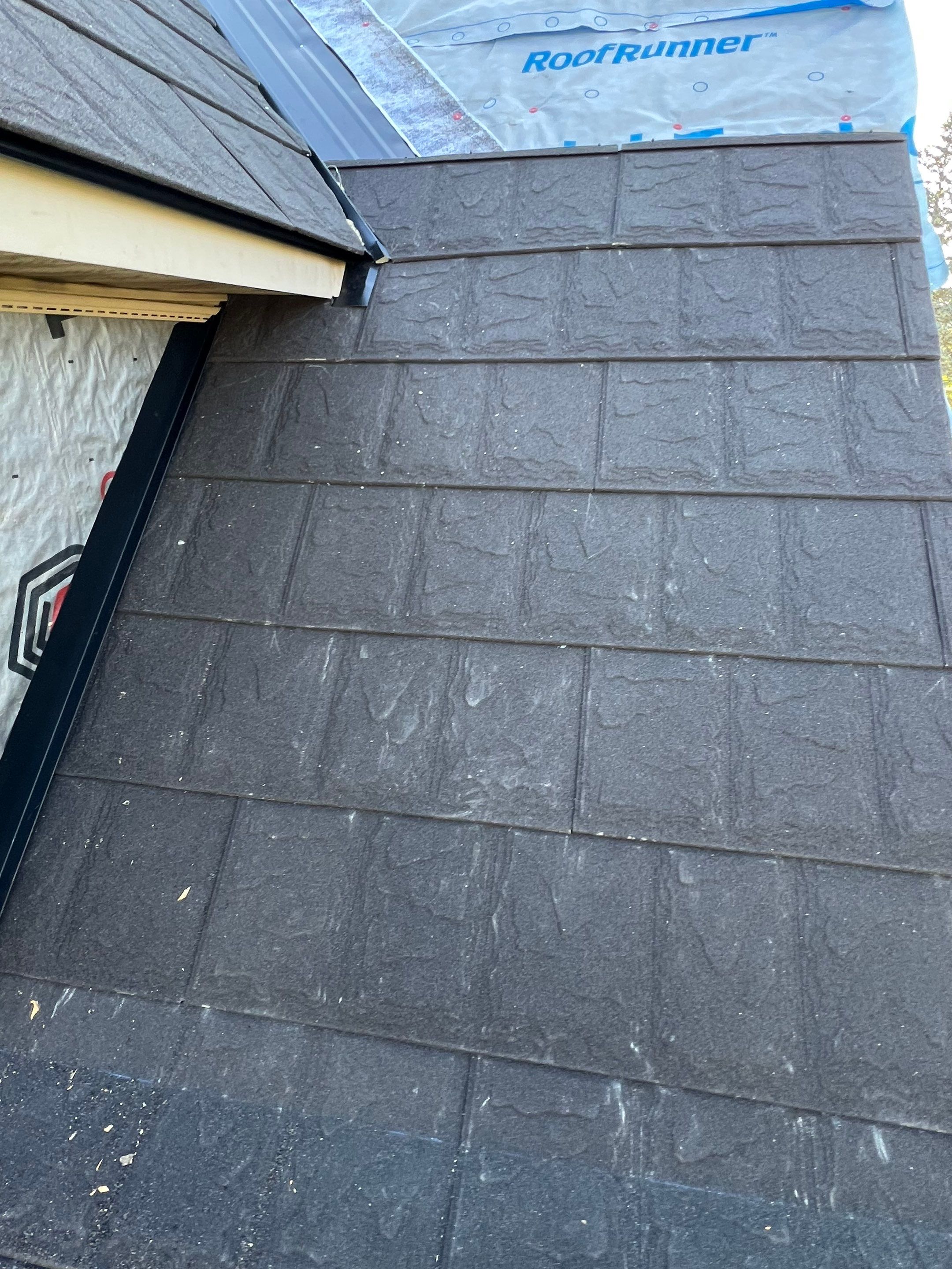 Residential Roofing Repair using Metstar Stone Coated Charcoal by Nitro Roofing and Construction