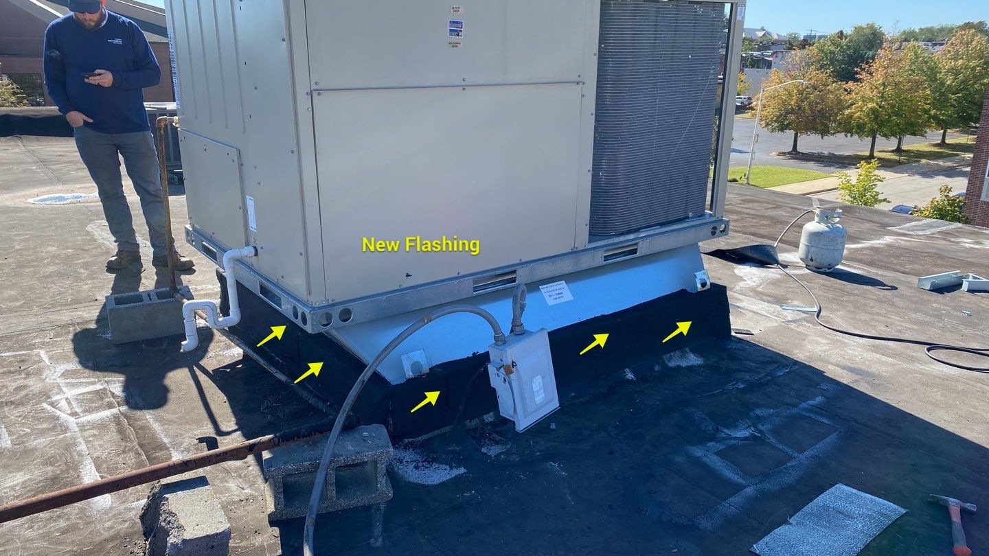 Commercial Roofing Repair using new Flashing by Alpha Design Services
