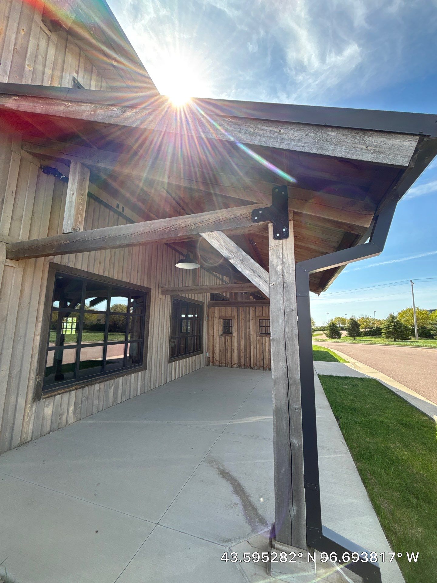 Commercial Exterior Wood Staining for Sanford Barn in Sioux Falls by Select Painting, Coatings & Garage Cabinets