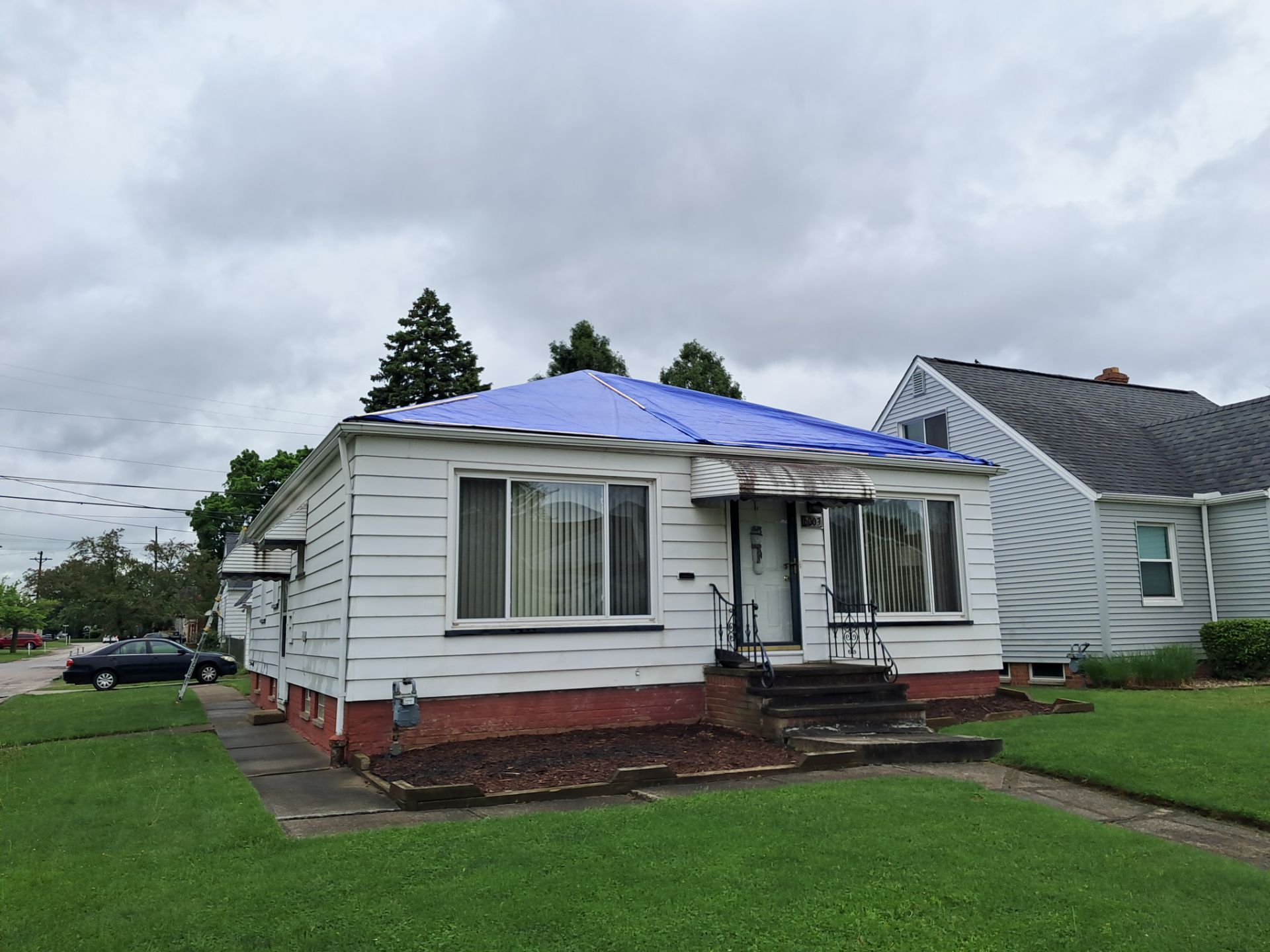 EMERGENCY TARPING ROOF BEFORE STORM using TARP by Absolute Roofing and Construction