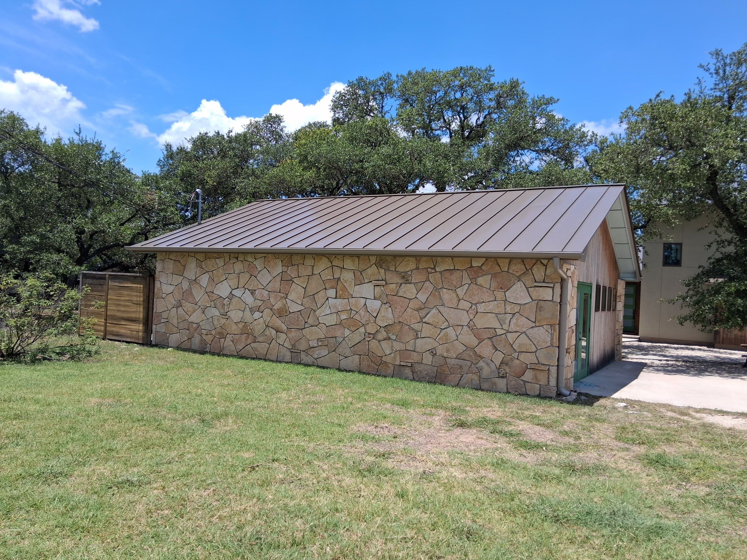 Residential Roof Replacement using 24 GA Double-Lock - Medium Bronze by Action Exteriors Austin