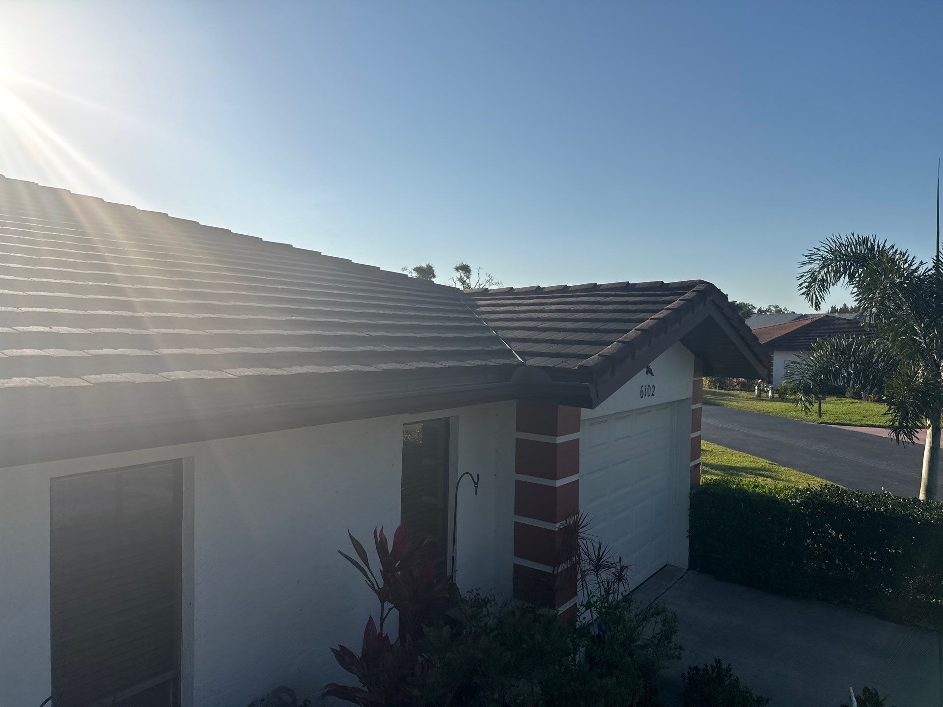 Tile Roof Cleaning – Vivenda at Bradenton I (5-Star Review & Plant Protection) by Sunshine AquaWash