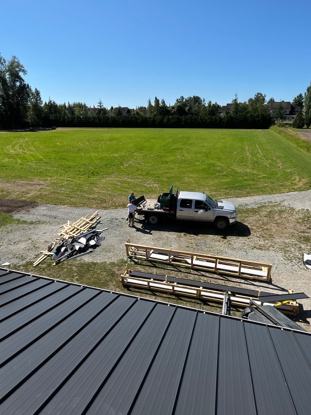 Residential Roofing Installation using 12" Prolok metal  by Top Notch Roofing Inc