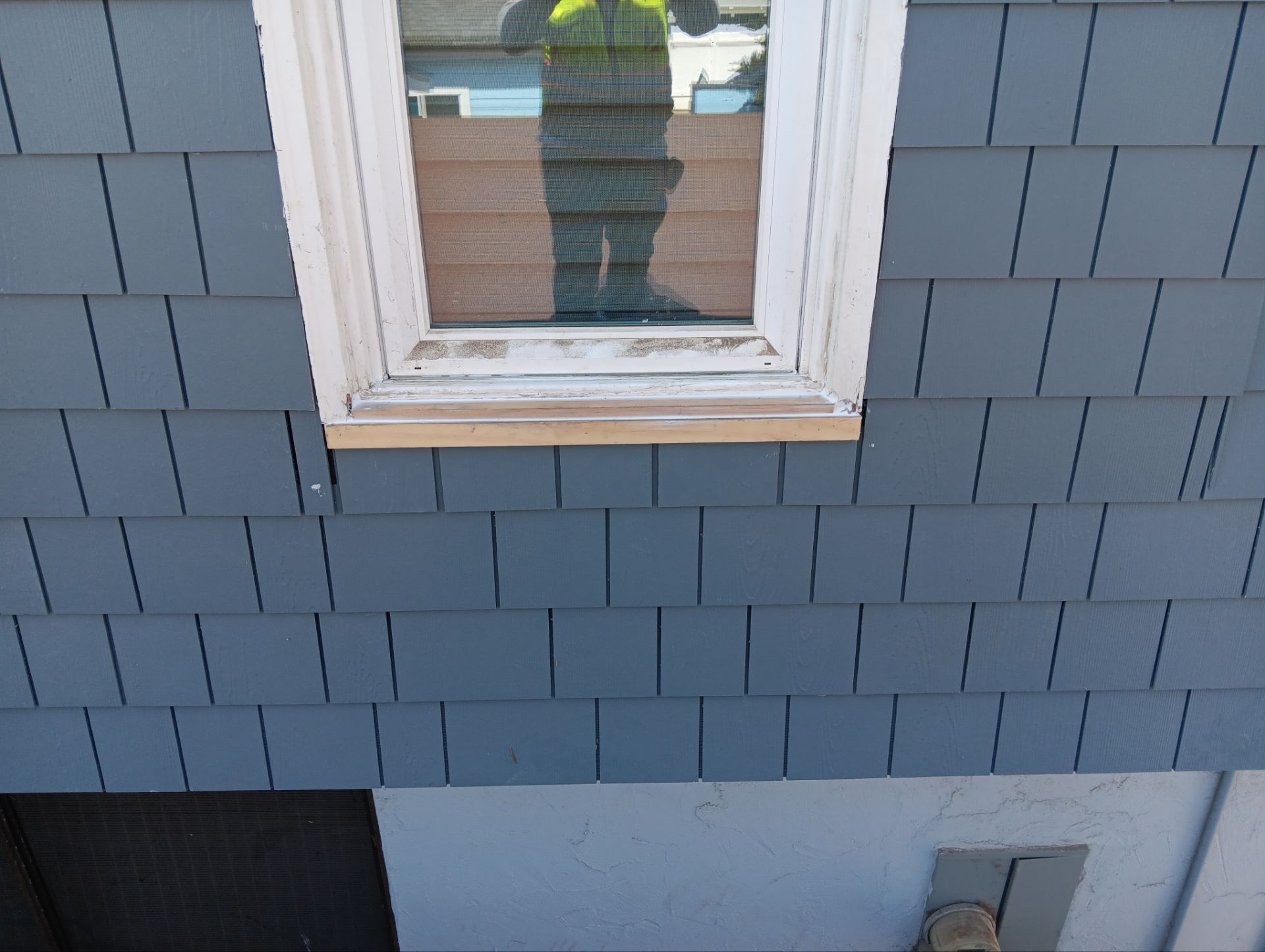 Pre-finish shingles by New Era Siding Inc 