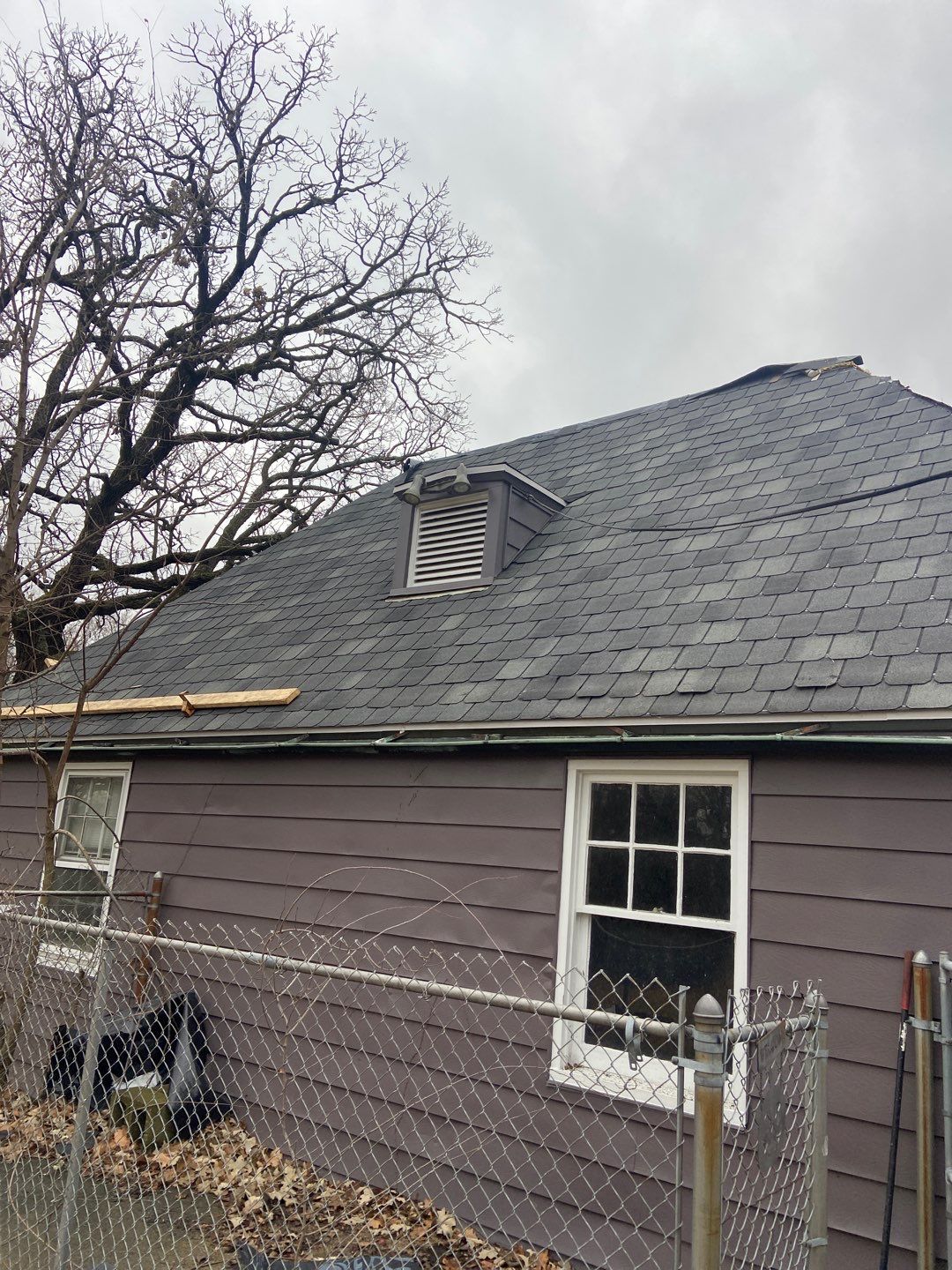 Slate Roof Removal using Atlas Storm Master Slate by Total Exteriors