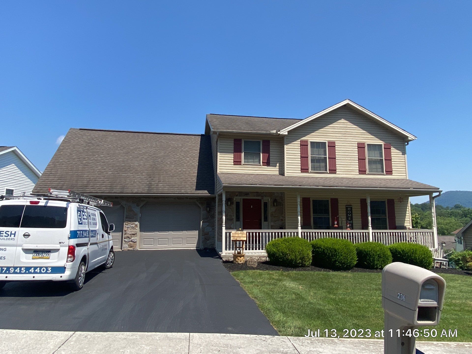Metal roof-colonial red by Esh Builders